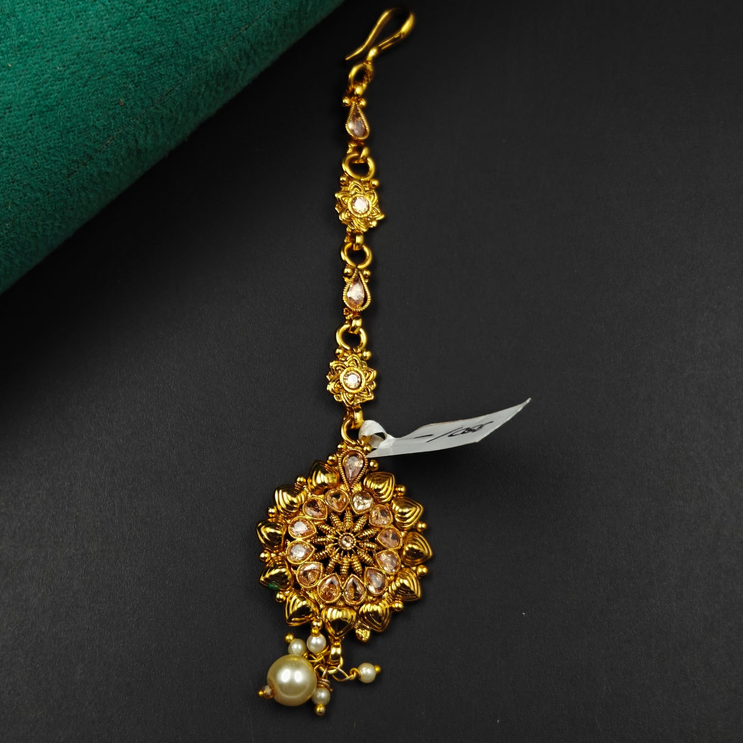 15862 Antique floral design gold maangtikka with kundan stones and pearl drops