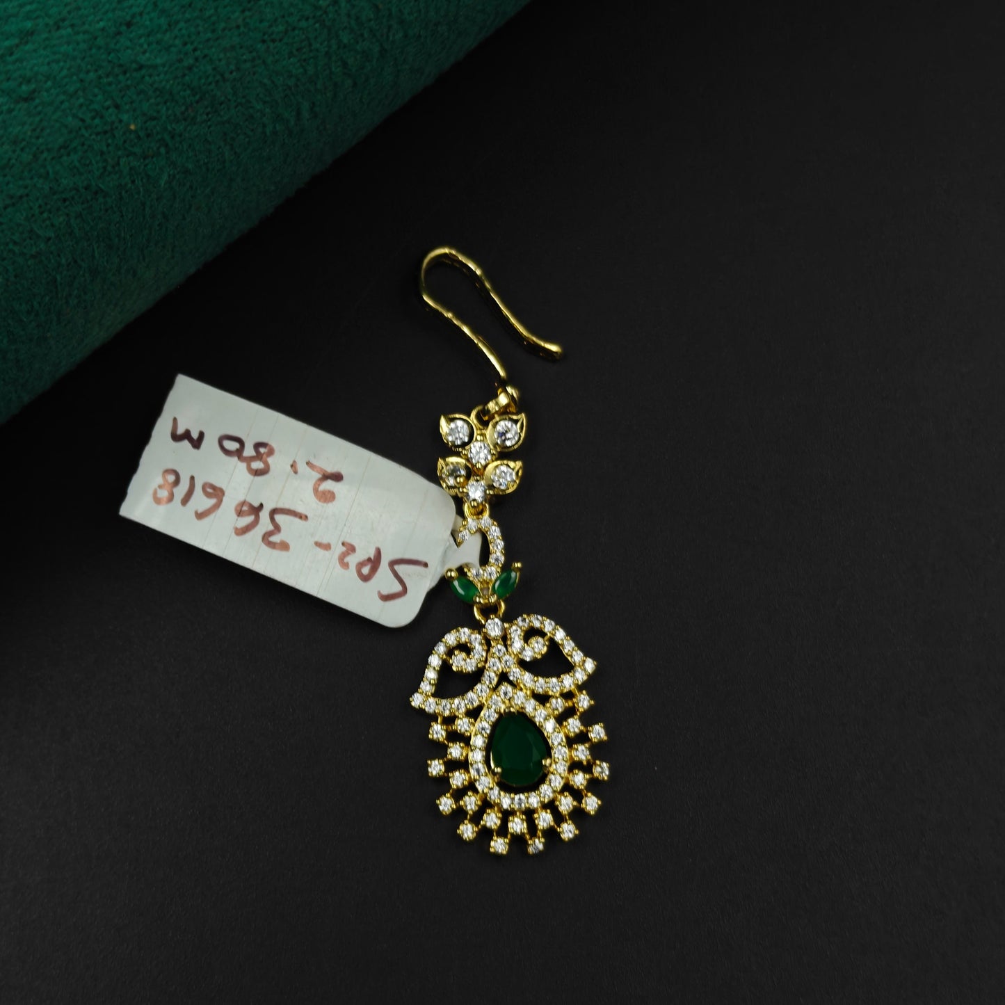 36618 Teardrop design maangtikka with green stone and white CZ crystals