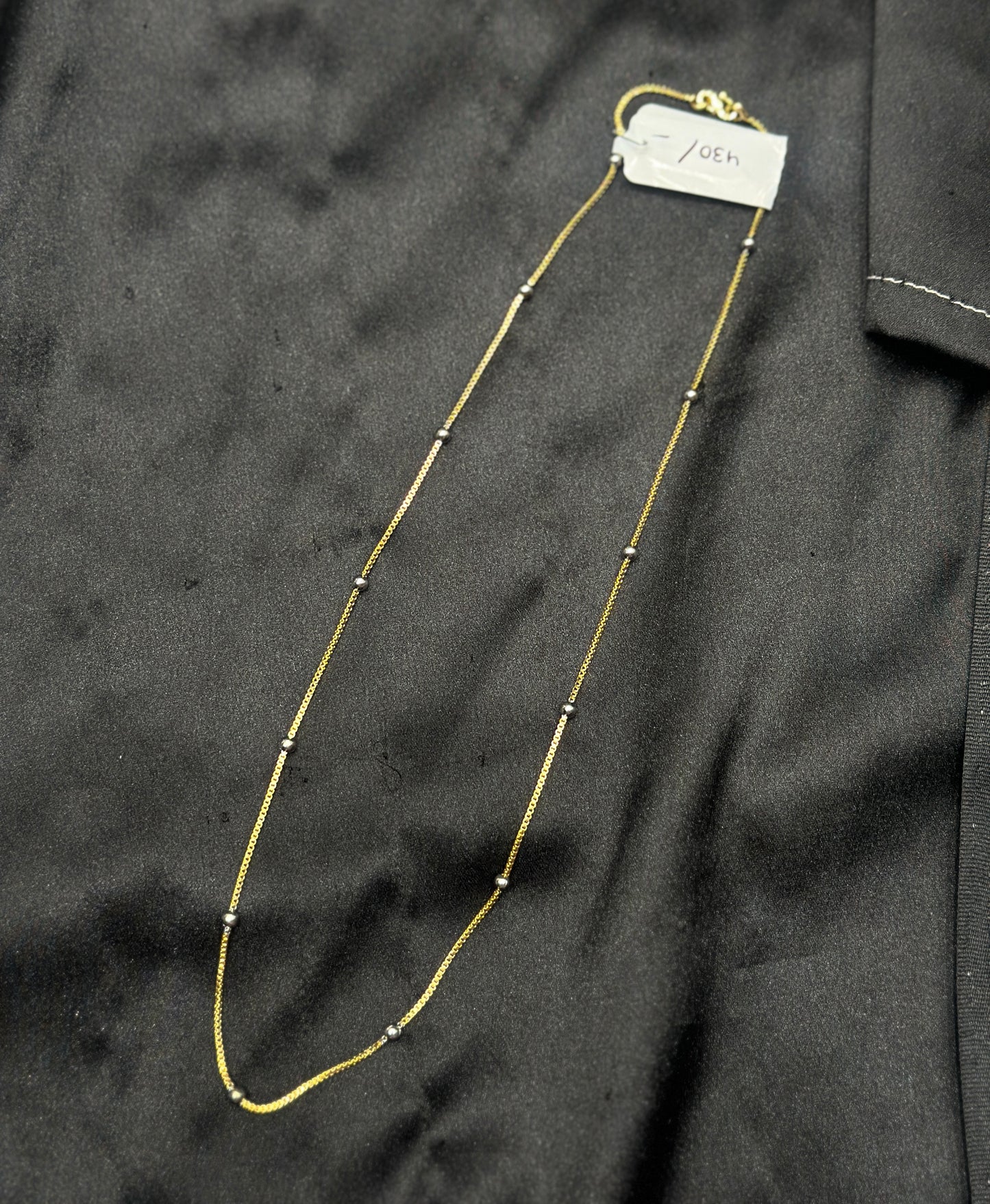 Silver balls gold chain