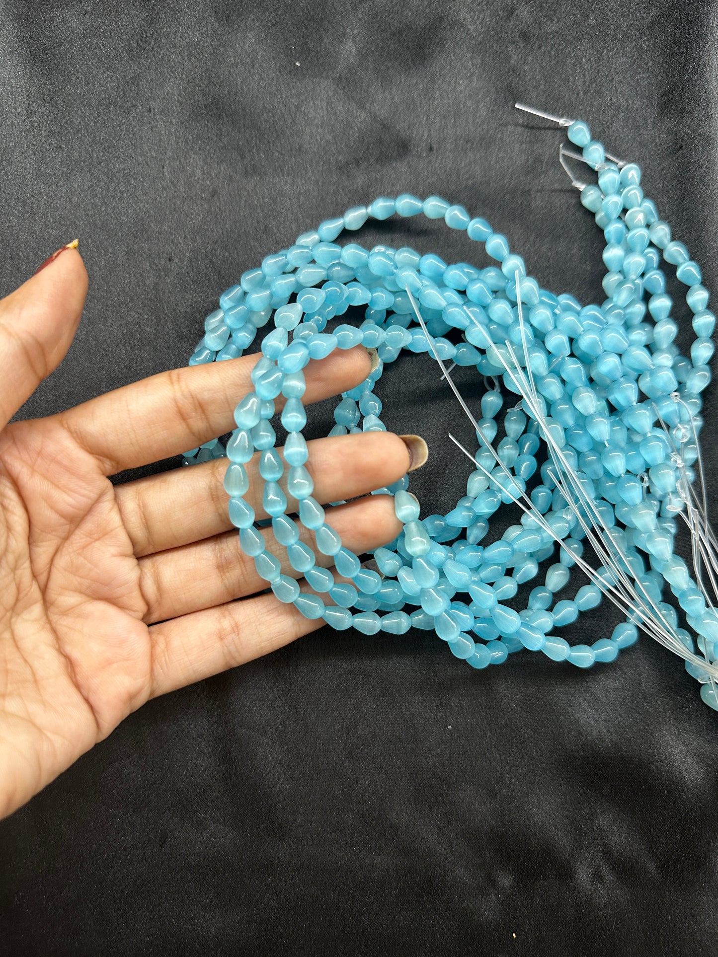 Blue tear drops per line