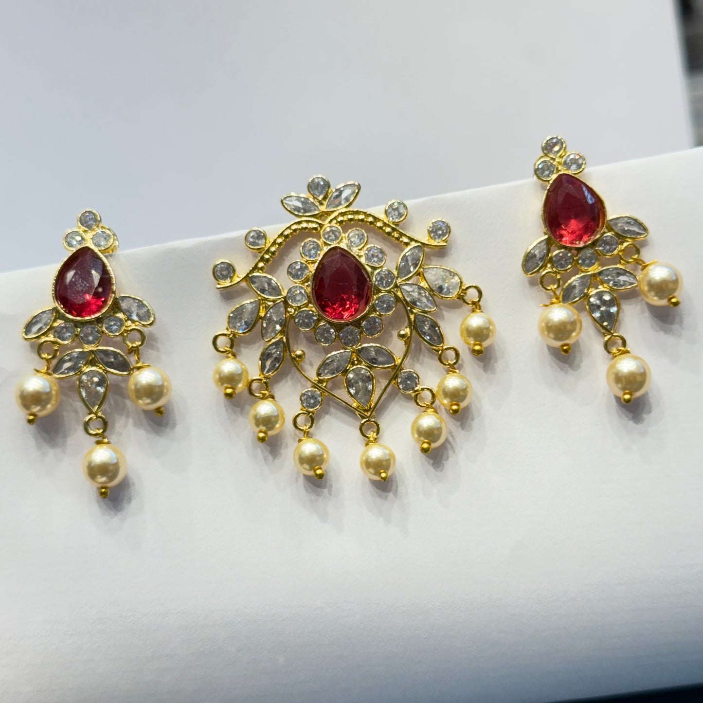 41036 Uncut stones Drop shape Ruby pendant set with screwback earrings