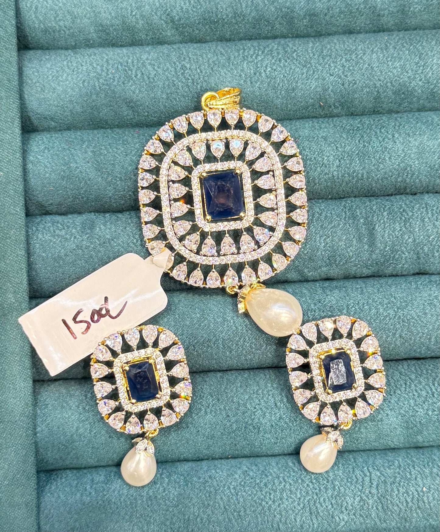 38679 real diamond look square shape pendant set with blue stone