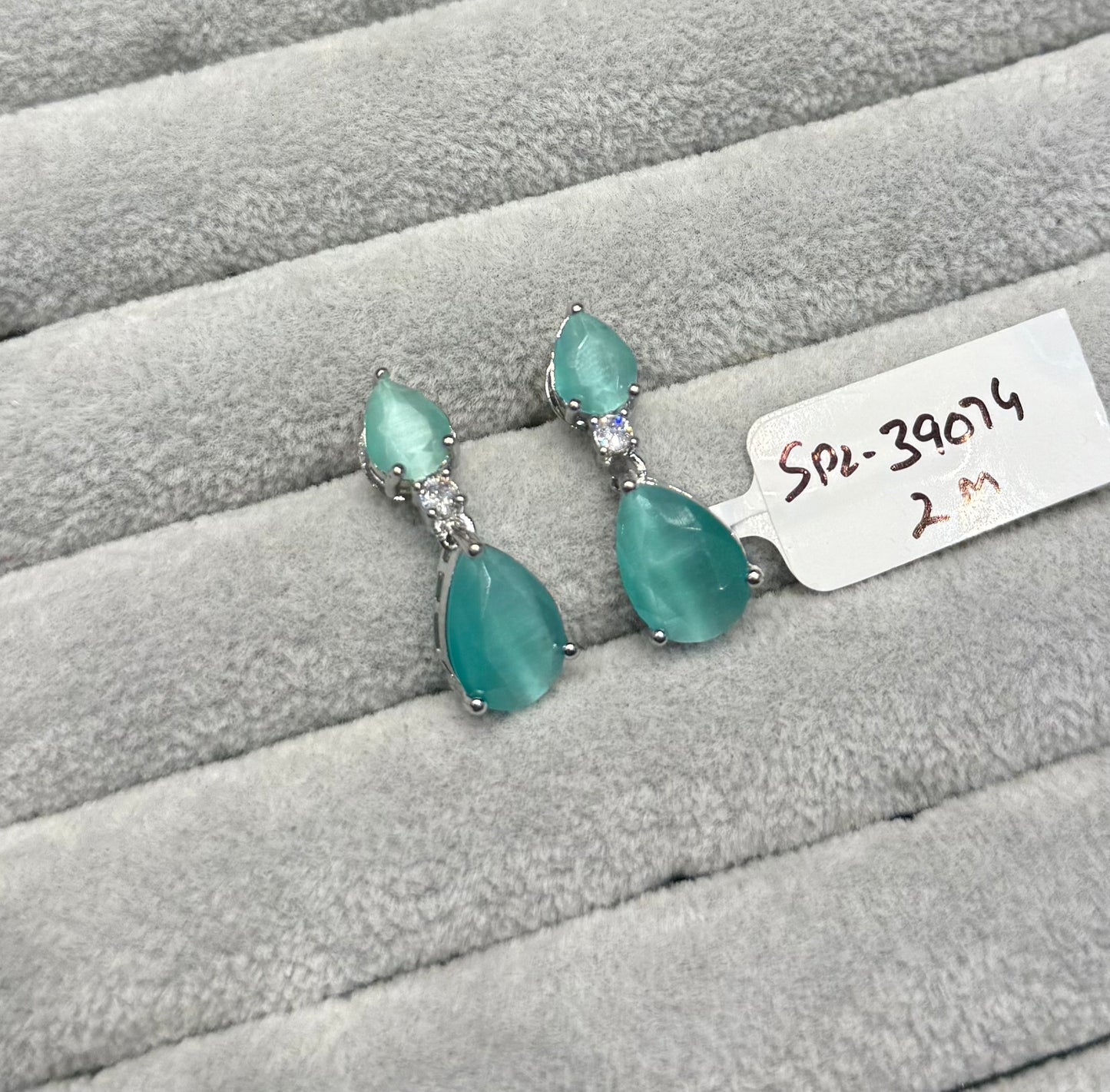 39074 Platinum fancy earrings with Mint color stone