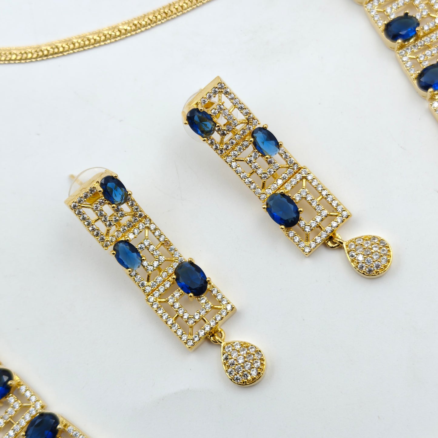 Gold polish blue stone necklace