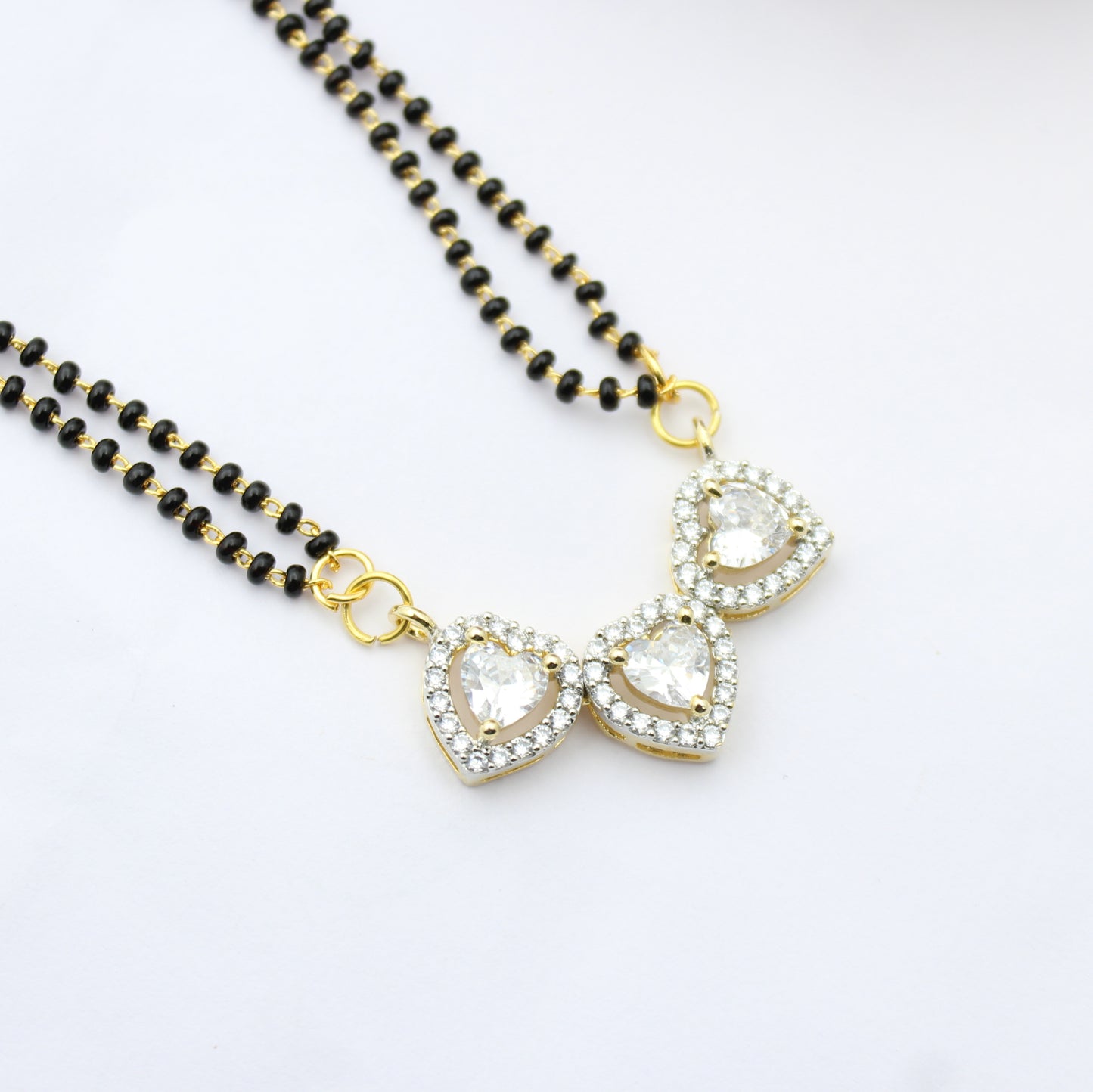 41625 GJ 3 Heart Shape Pendant Set With 2 Lines Black Beads Mala