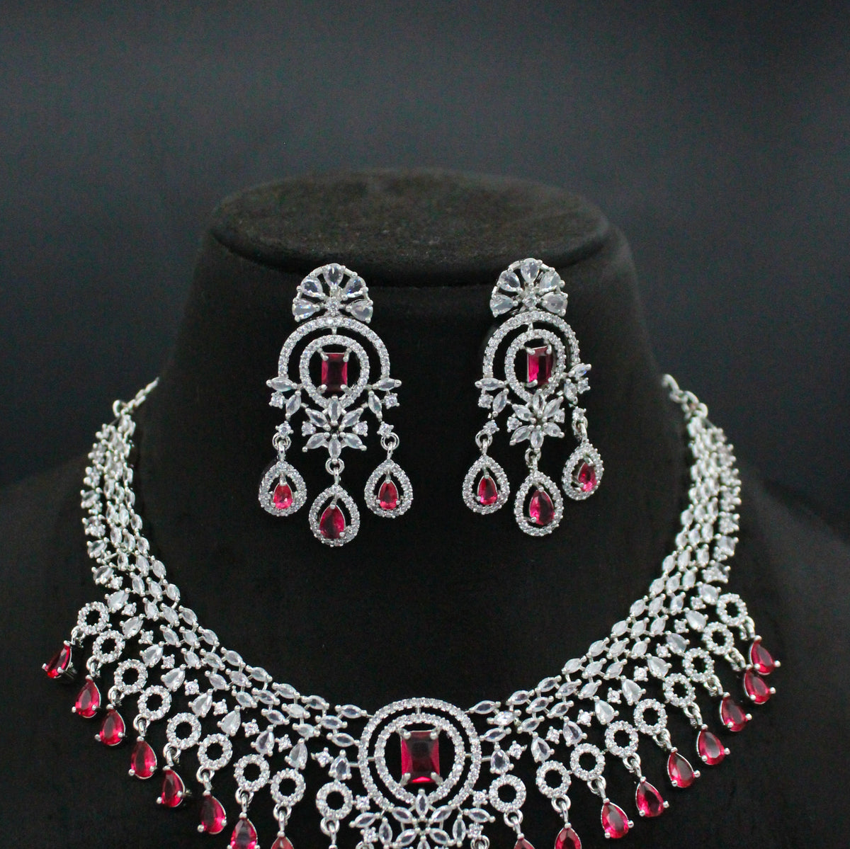 Red stone platinum finish short necklace with hanging details