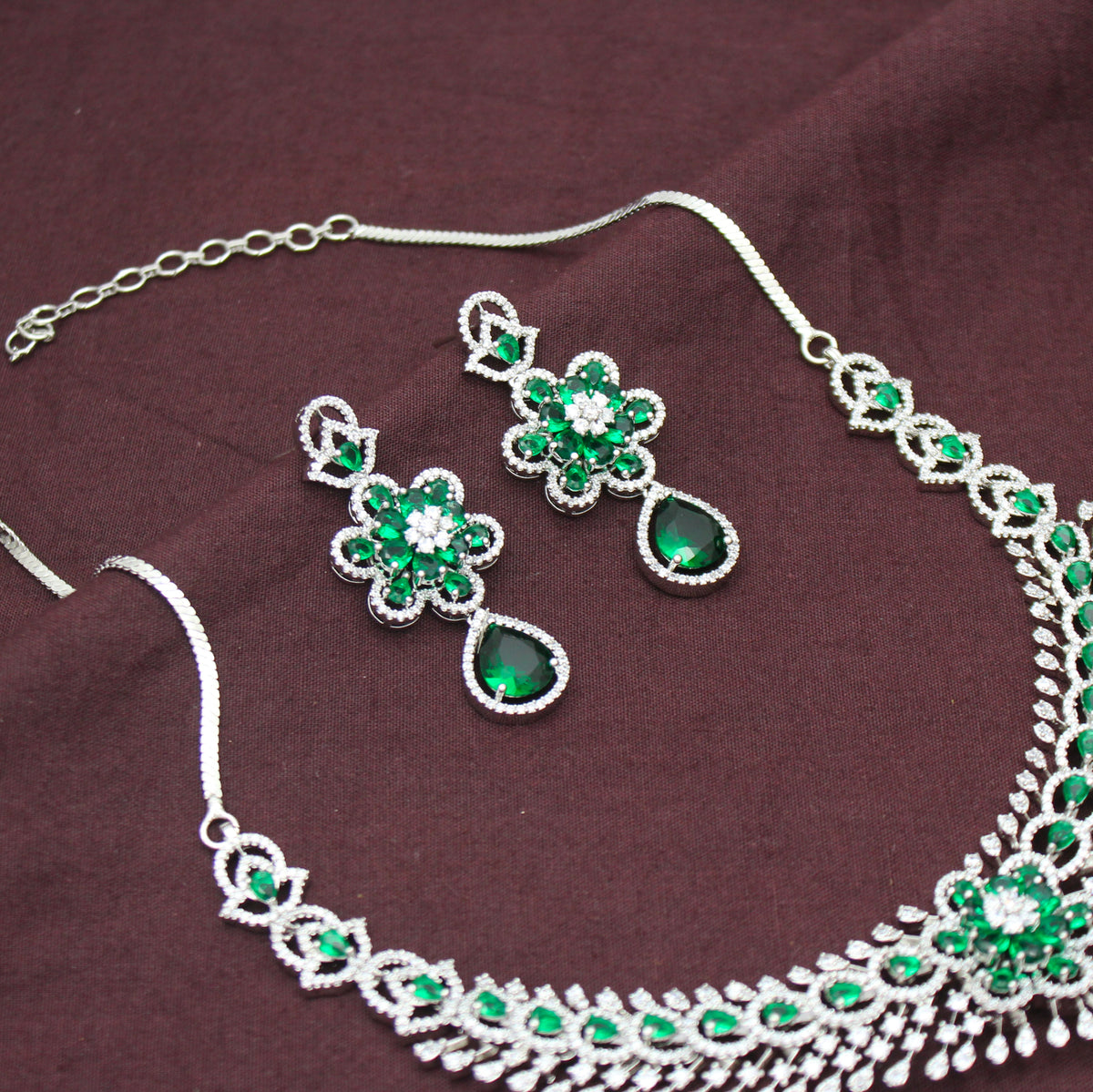 Elegant Platinum Floral Drop Stone Emerald Green Fancy Short Necklace Set With Push Back Statement Earrings Party Wear Jewellery 43000