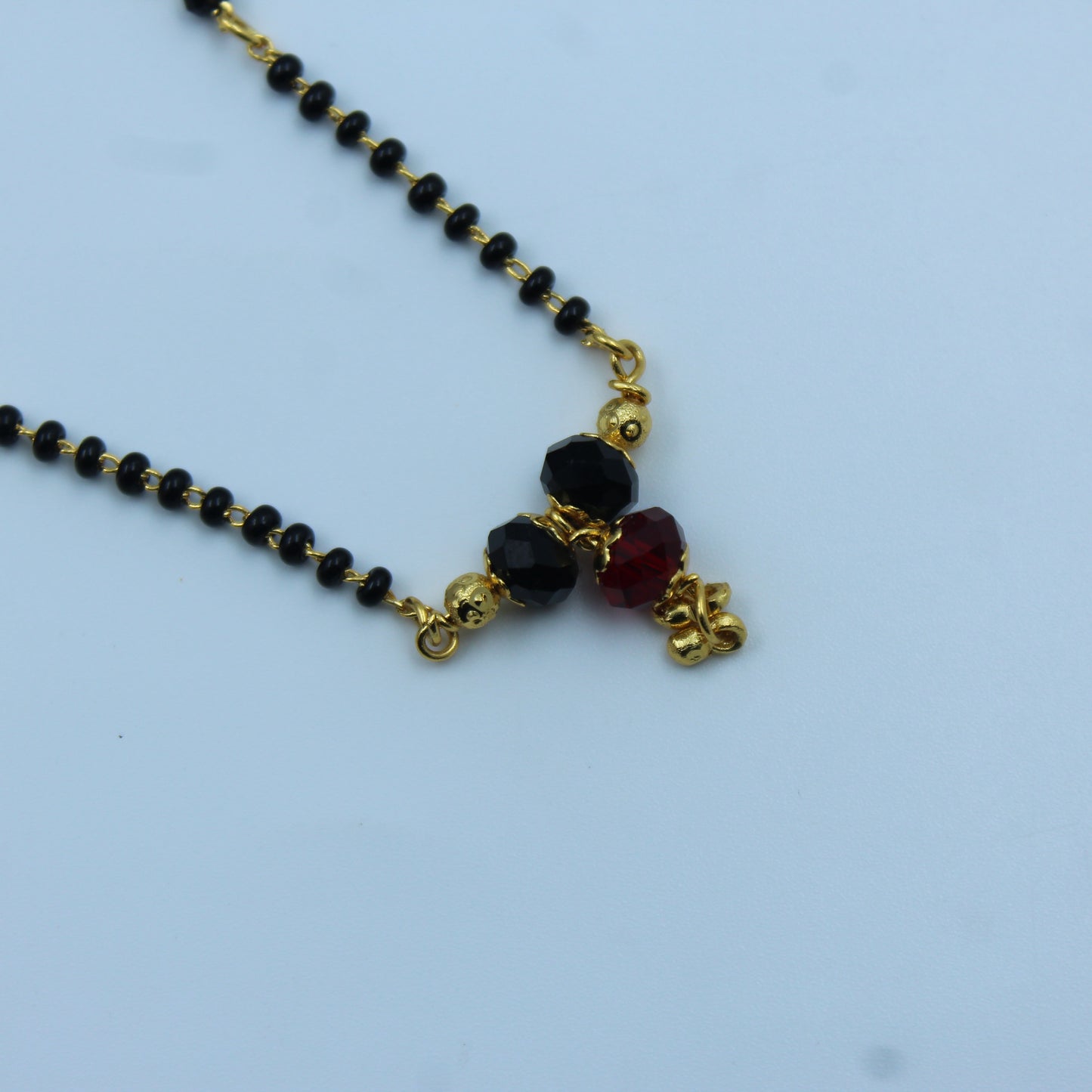 14278 Single Chain Black Bead Mangalsutra with Red Stone Pendant