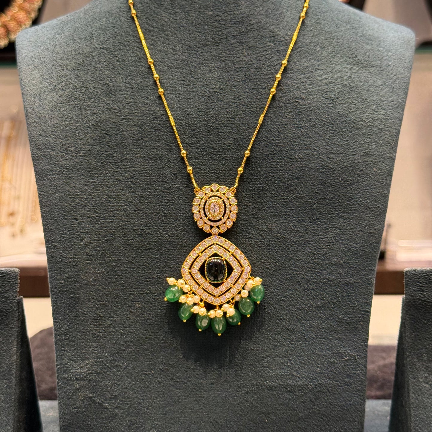 40051 Single Line Golden ball chain with green pendant set