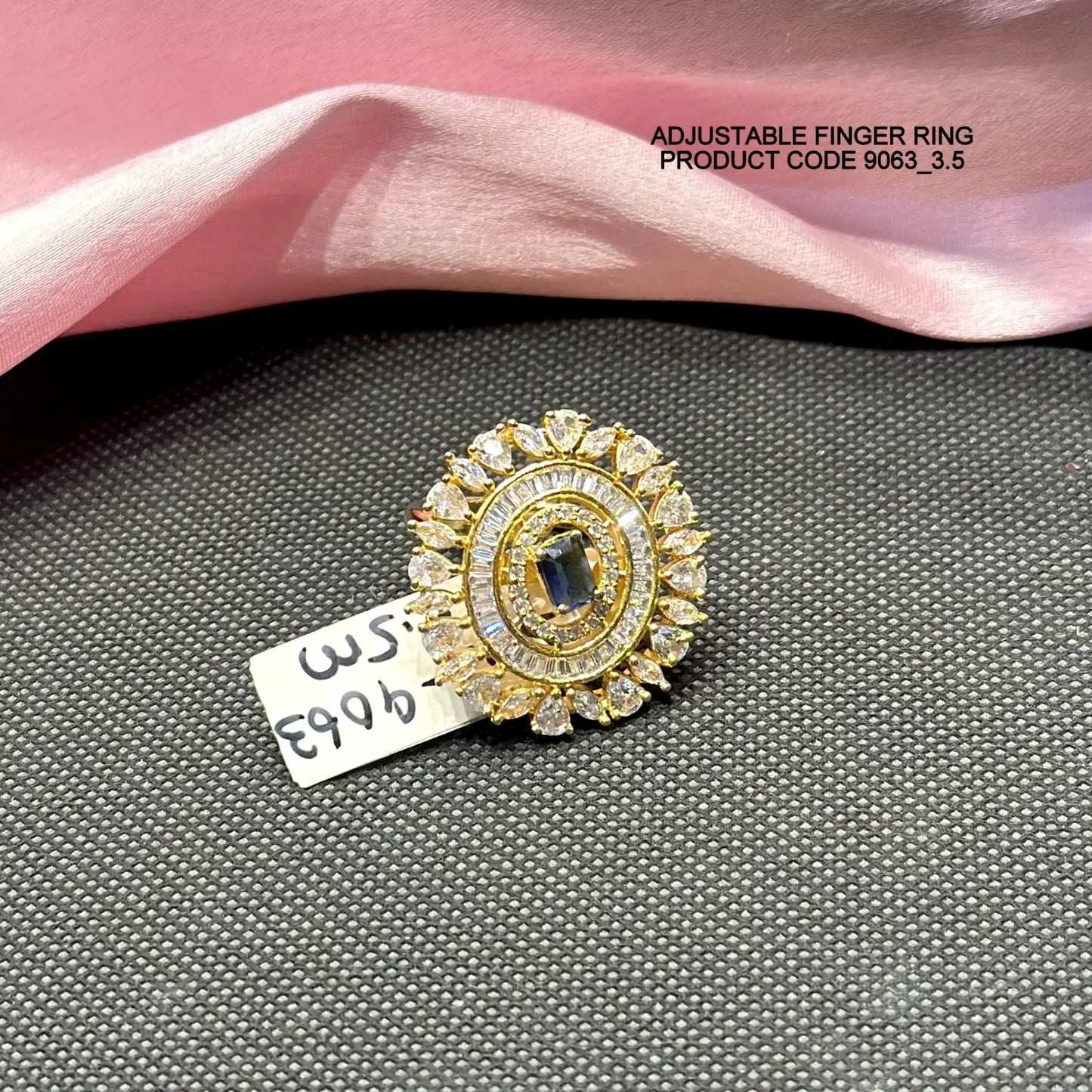 9063 Gold polish Adjustable Finger ring with blue stone