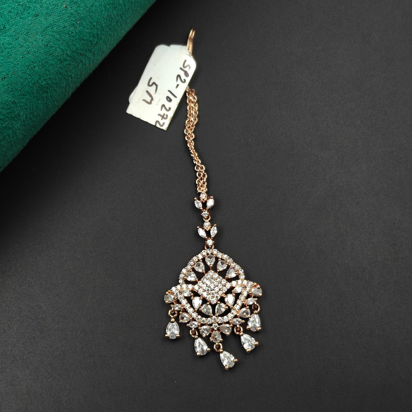 10272 Round floral design rose gold maangtikka with white CZ crystals