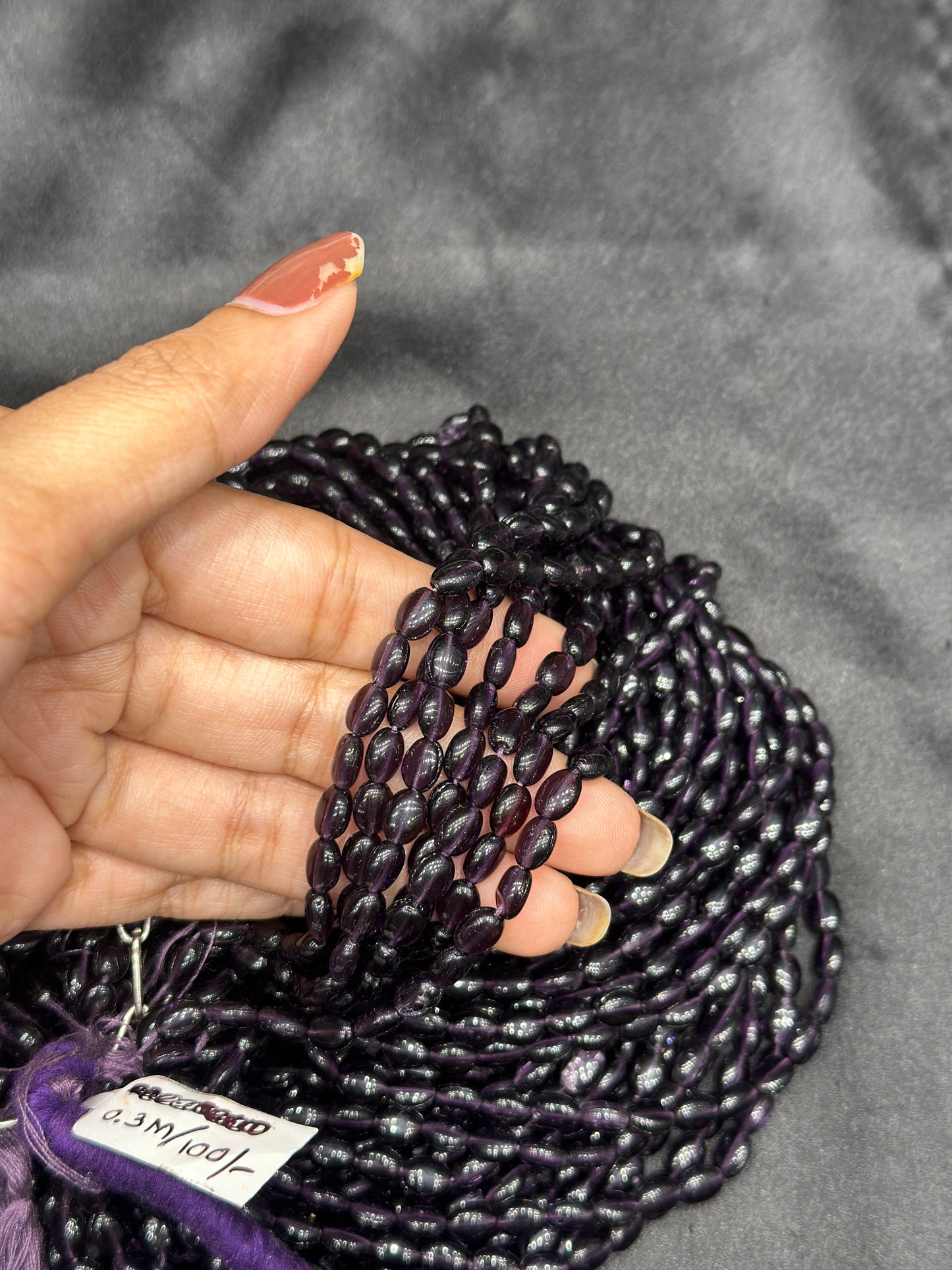 Dark purple beads per line