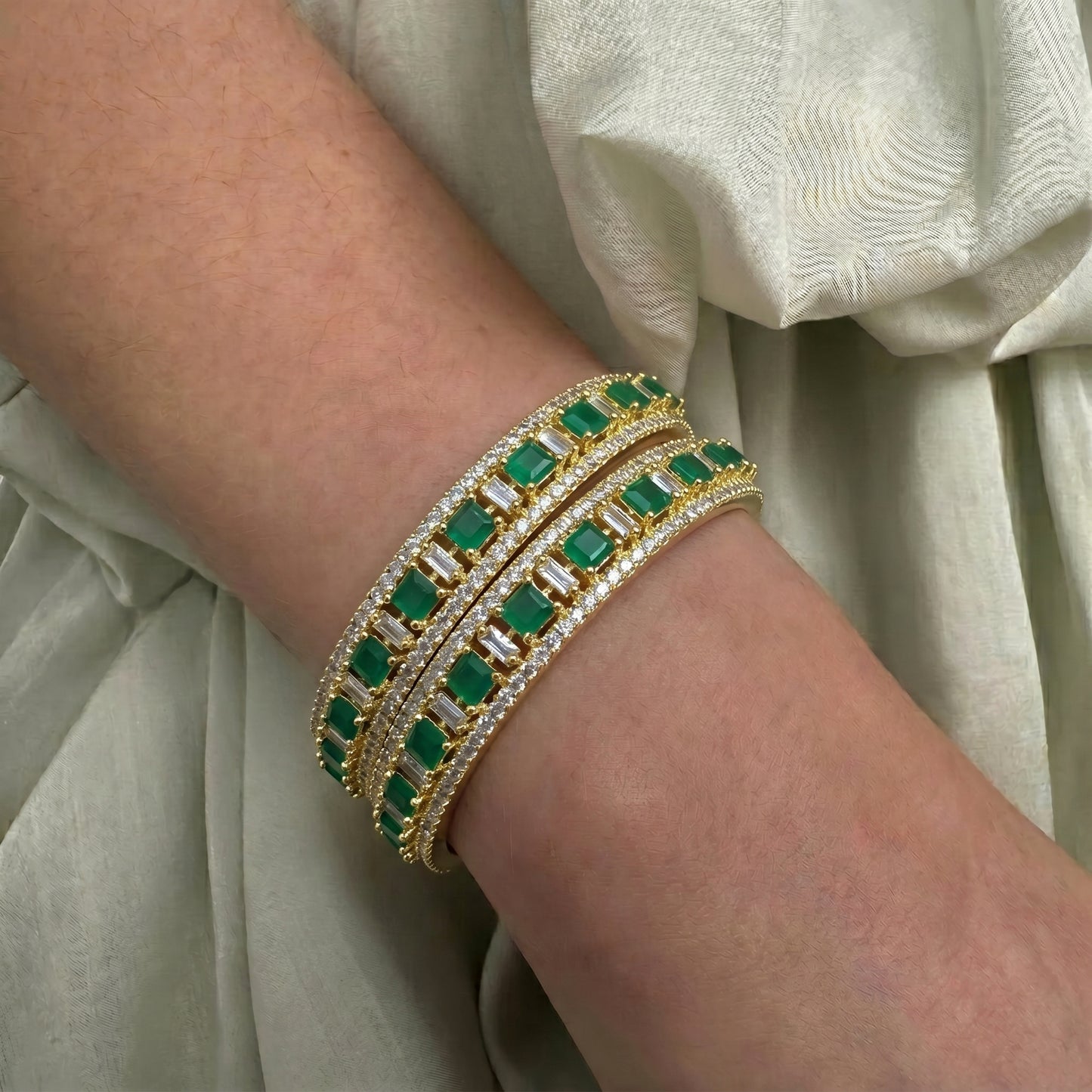 17089 Gold Polishing emerald stones bangles