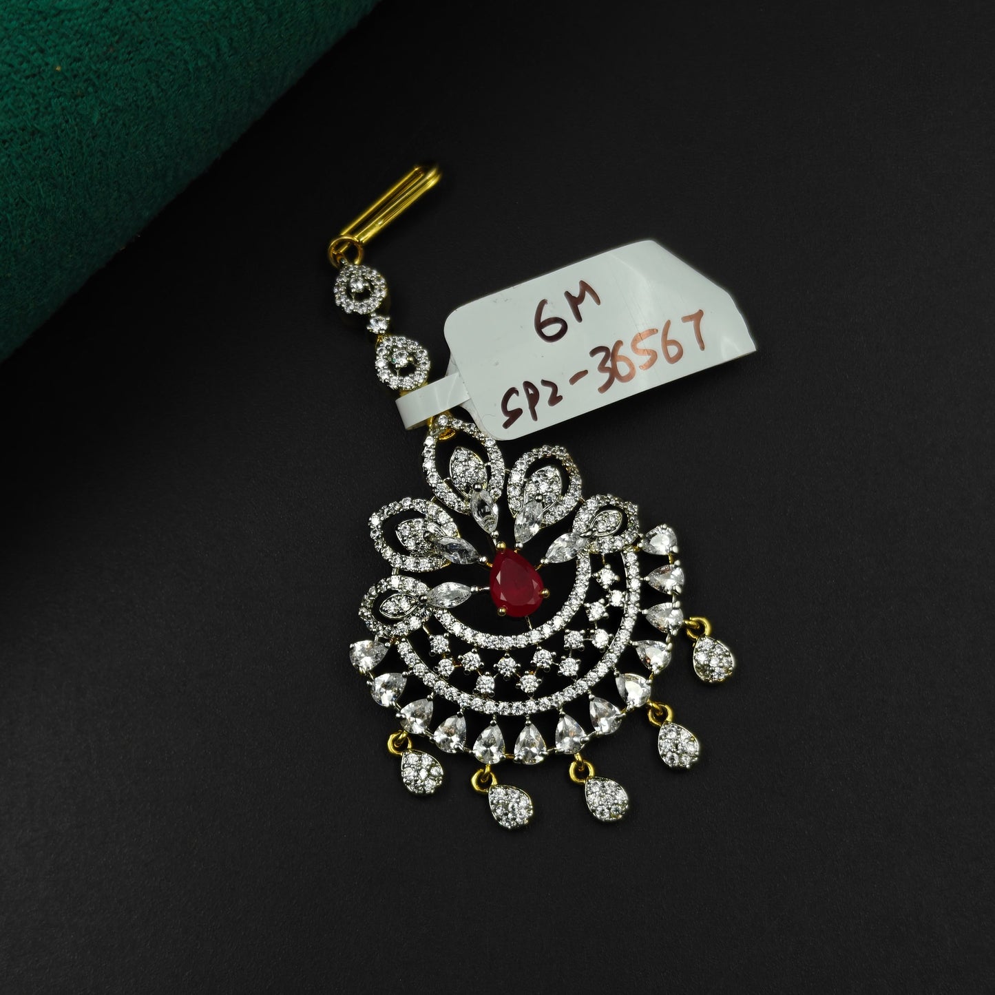 36567 Peacock design maangtikka with red stone and white CZ crystals