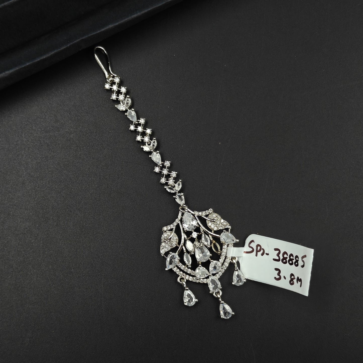 38885 Leaf design maangtikka with white CZ stones