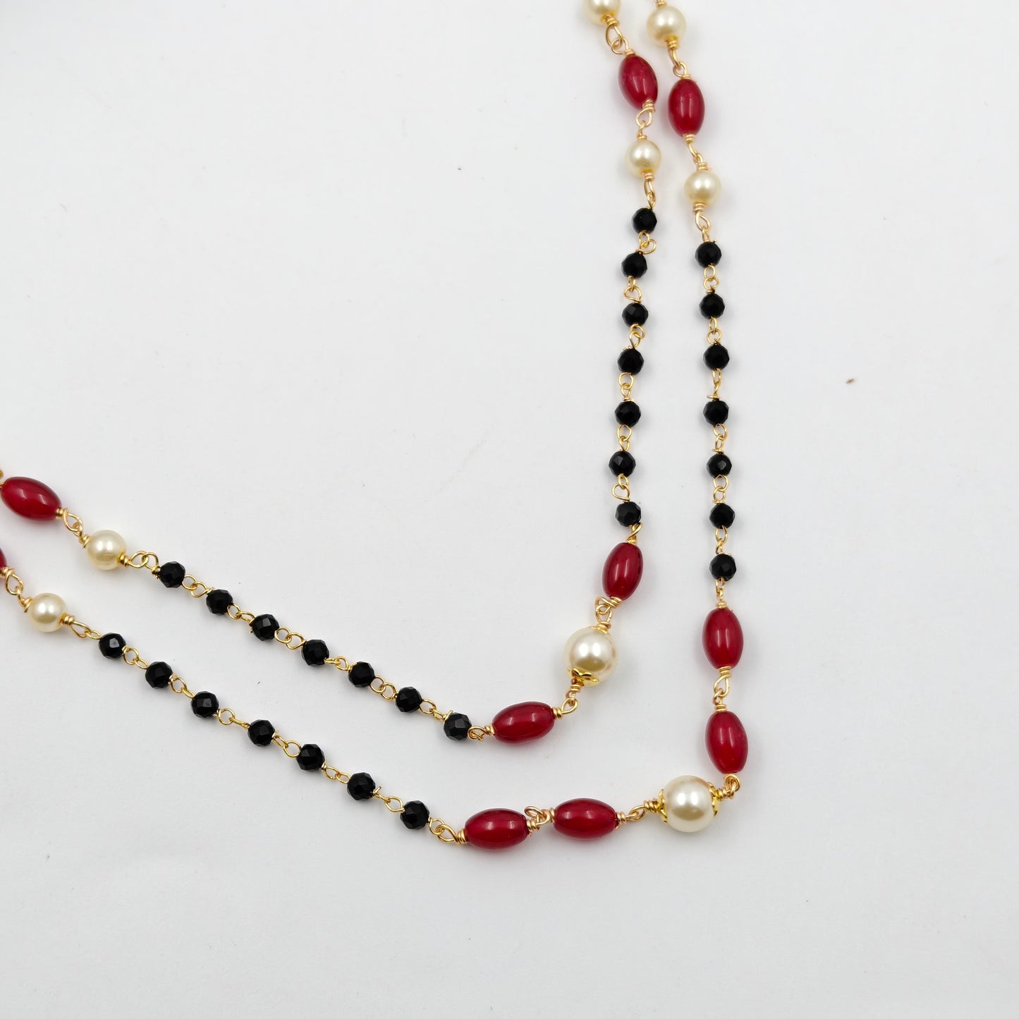 40431 2 line gold replica black beads with red monalisa beads