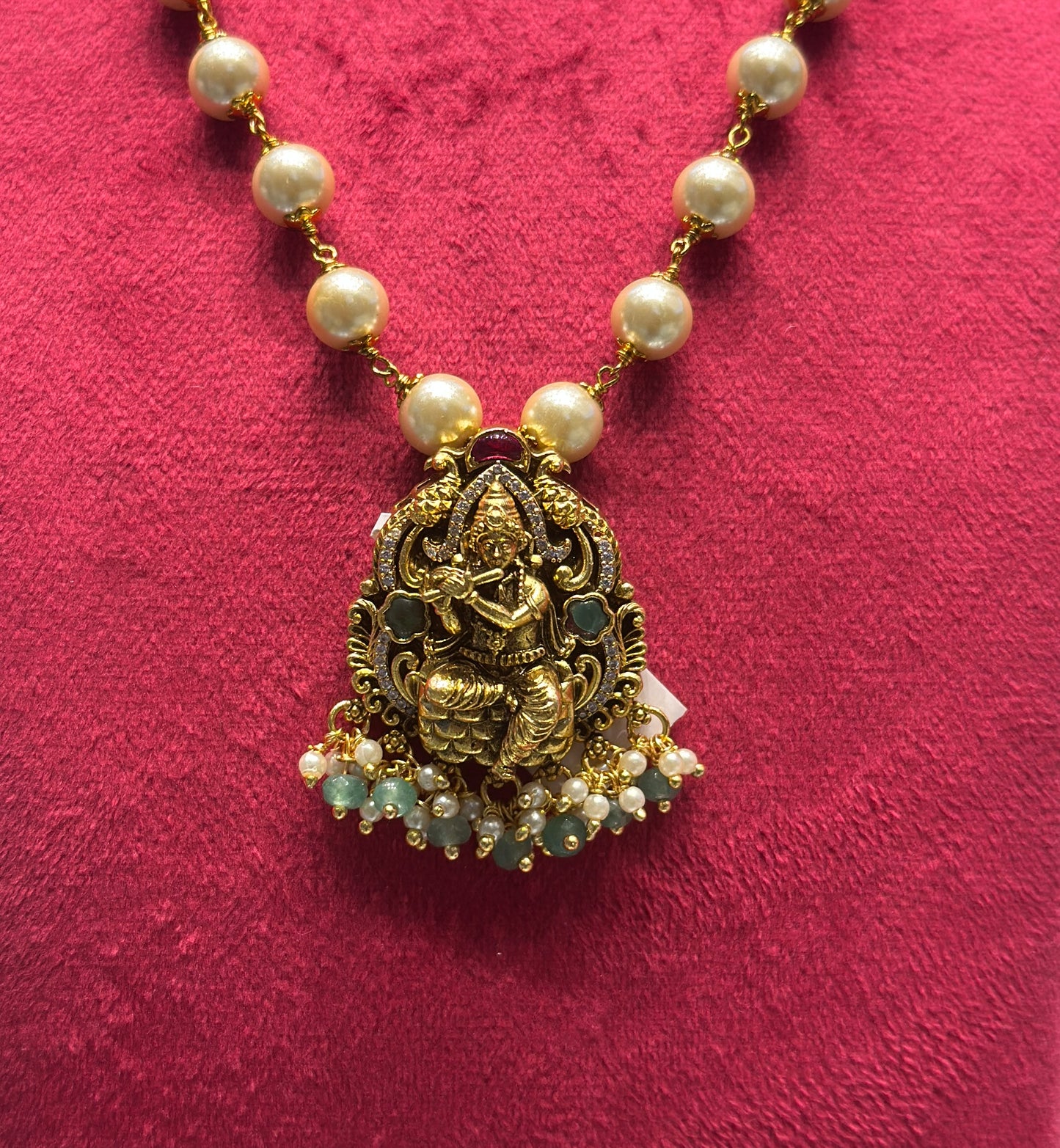 Krishna pendant with pearl mala