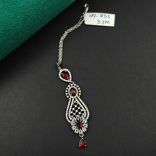 857 Elongated teardrop design maangtikka with red stones and white CZ crystals