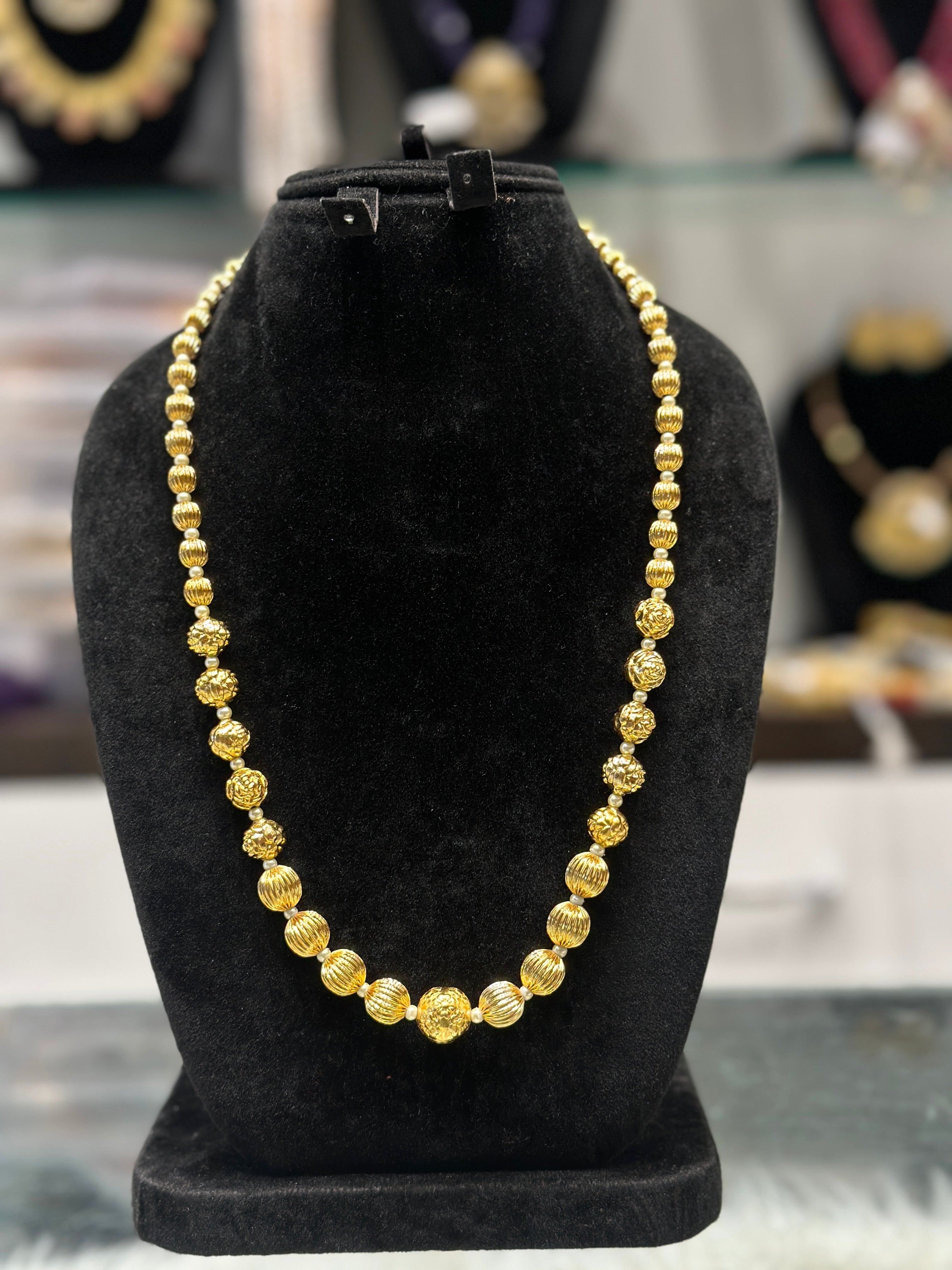Gold balls mala store