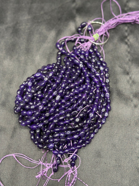 Purple color monalisa beads per line