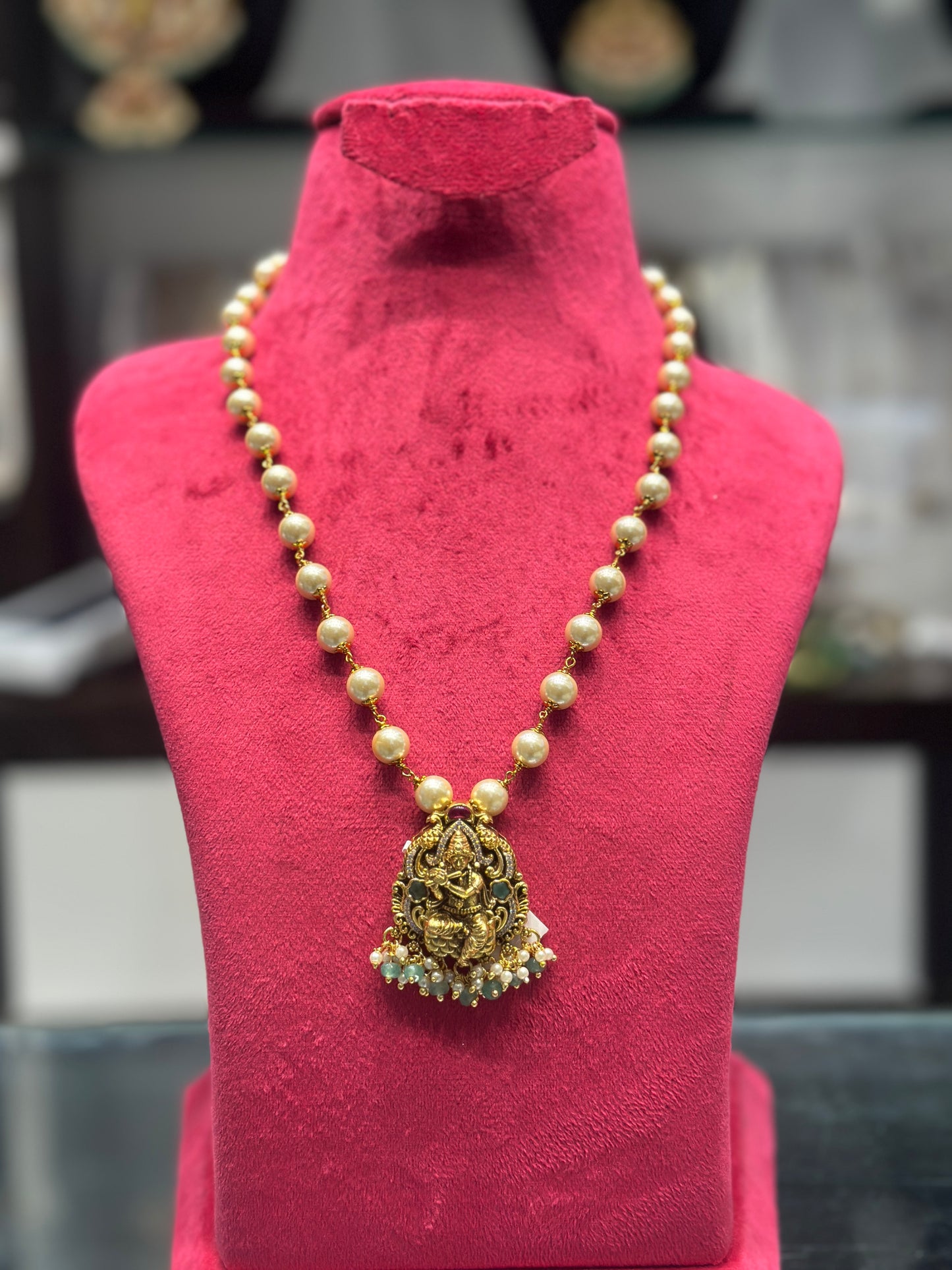 Krishna pendant with pearl mala