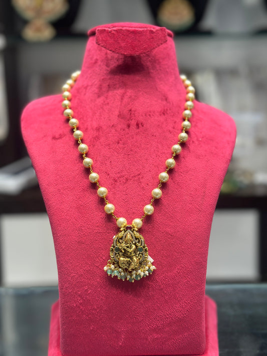 Krishna pendant with pearl mala