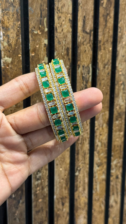 17089 Gold Polishing emerald stones bangles
