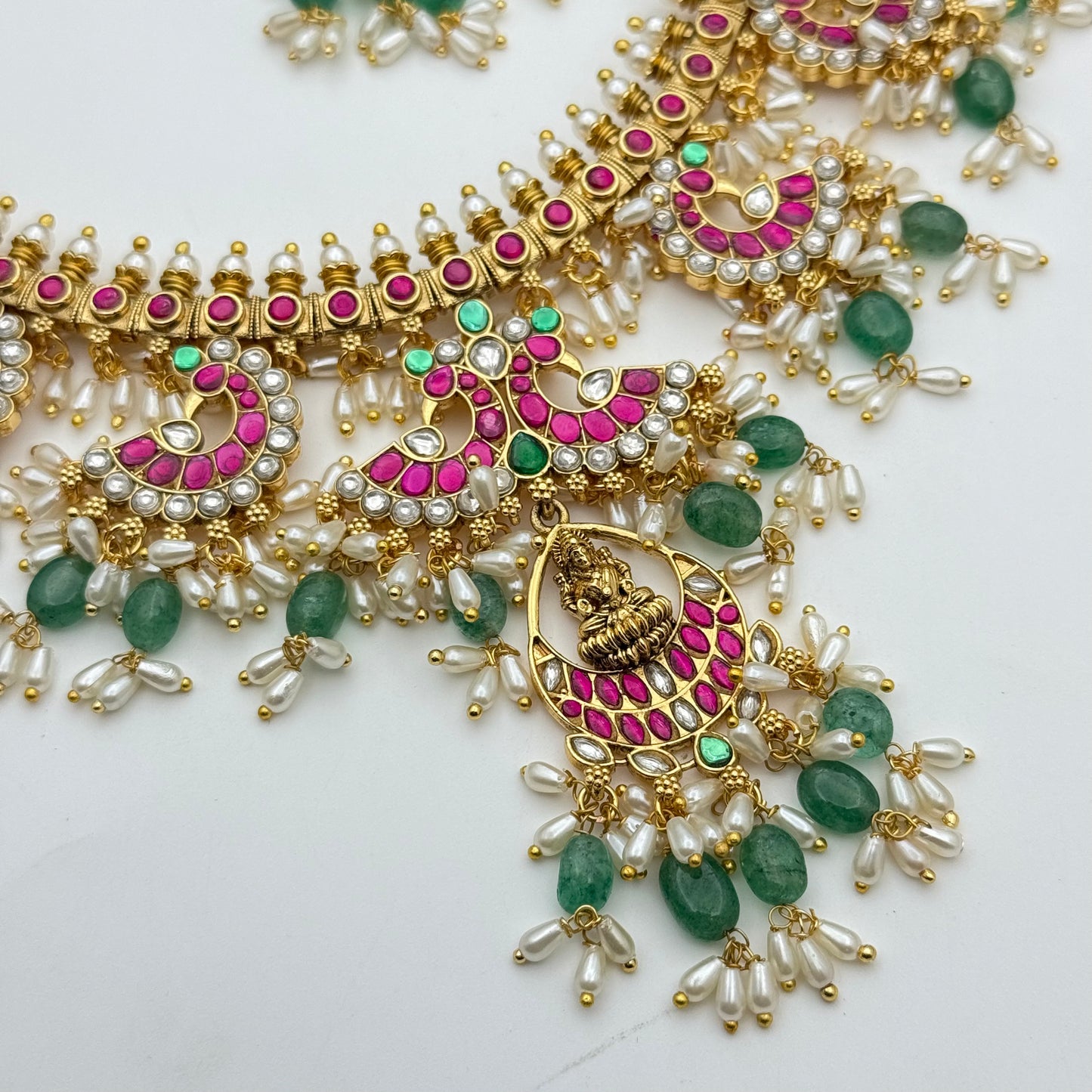 41838 Hand Made Jadau guttapusalu with Lakshmi locket and Rice pearls and Russian strawberry beads bridal design