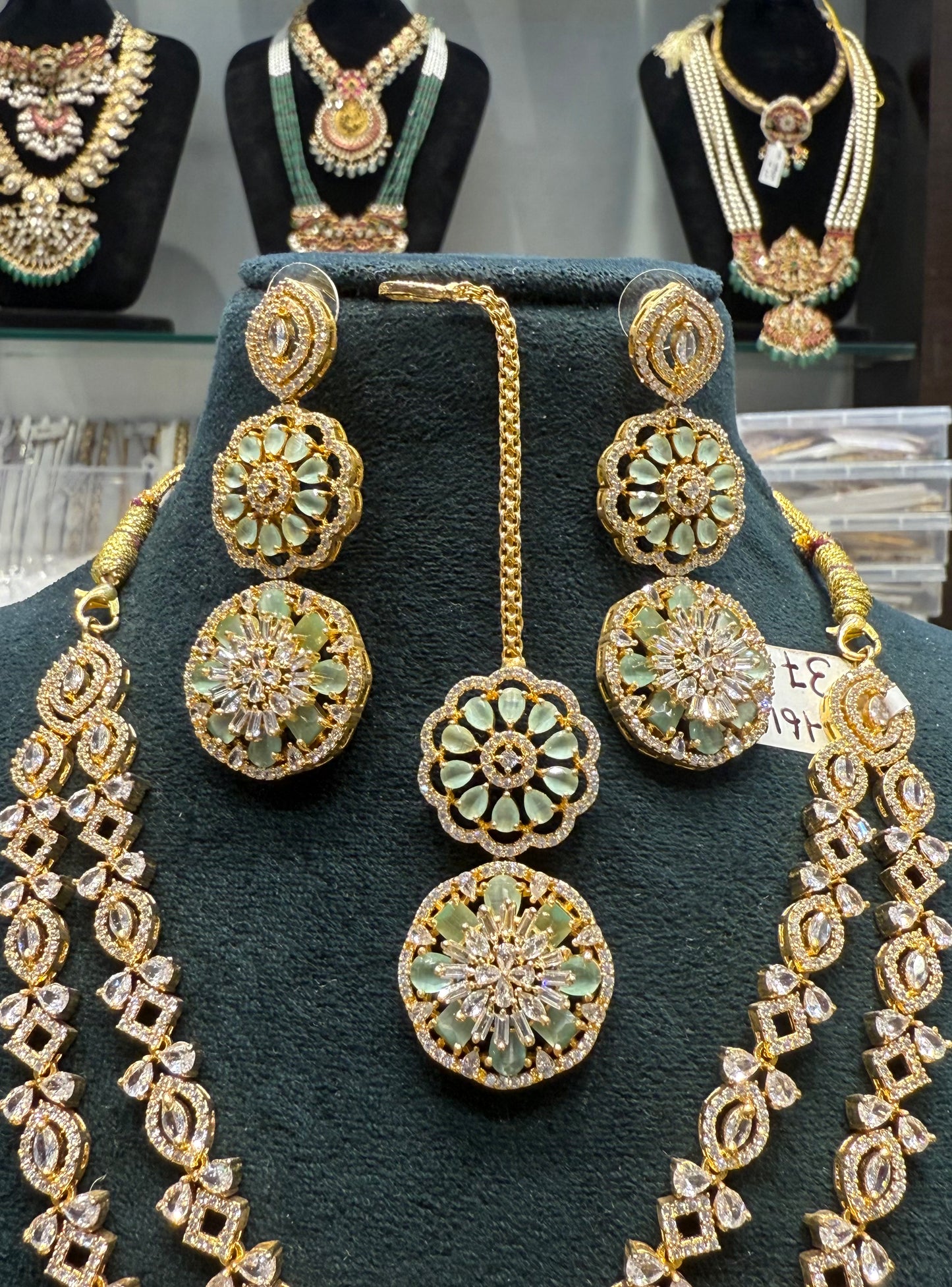 36167 gold polish CZ/AD stone 2 layered necklace with mint stone, earrings and tikka