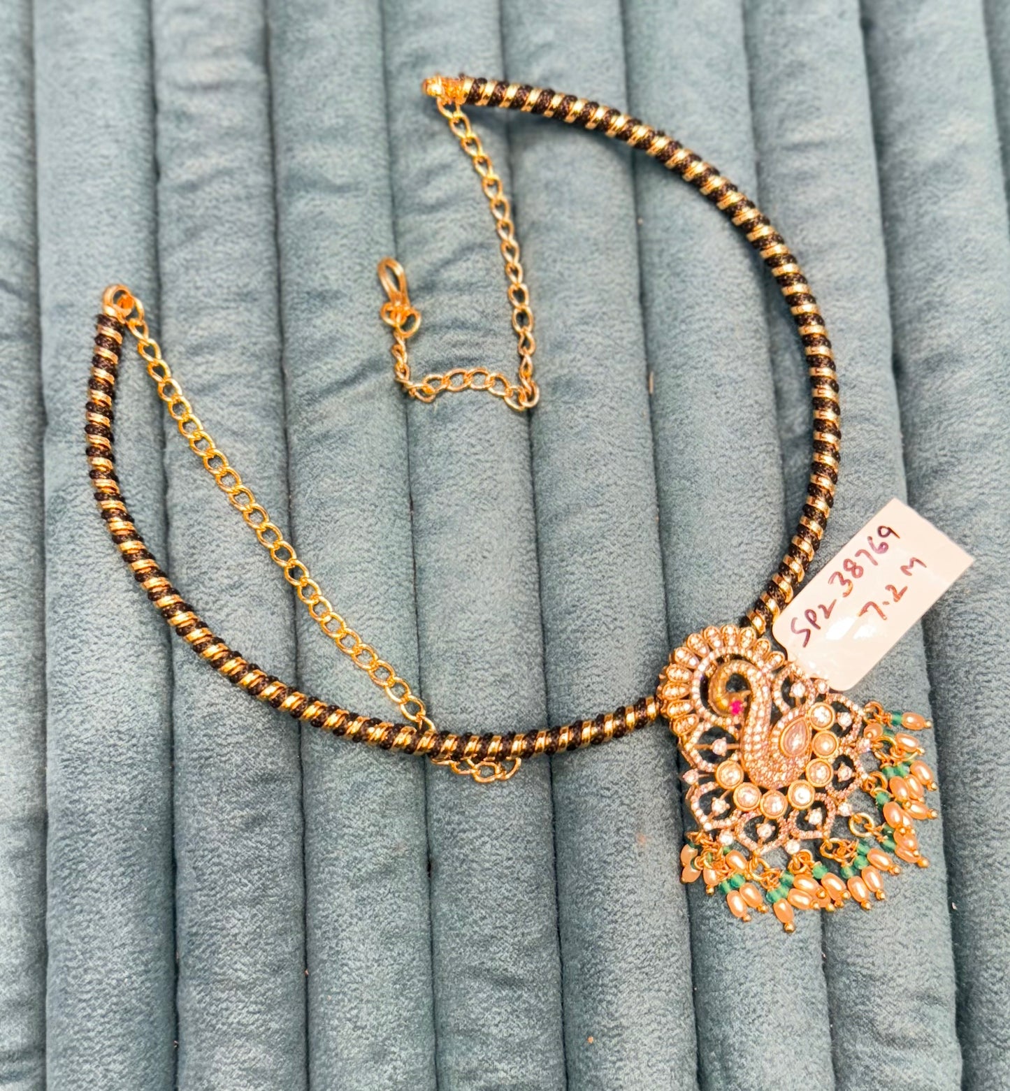 38769 Peacock pattern Victorian locket with black Dori kanthe