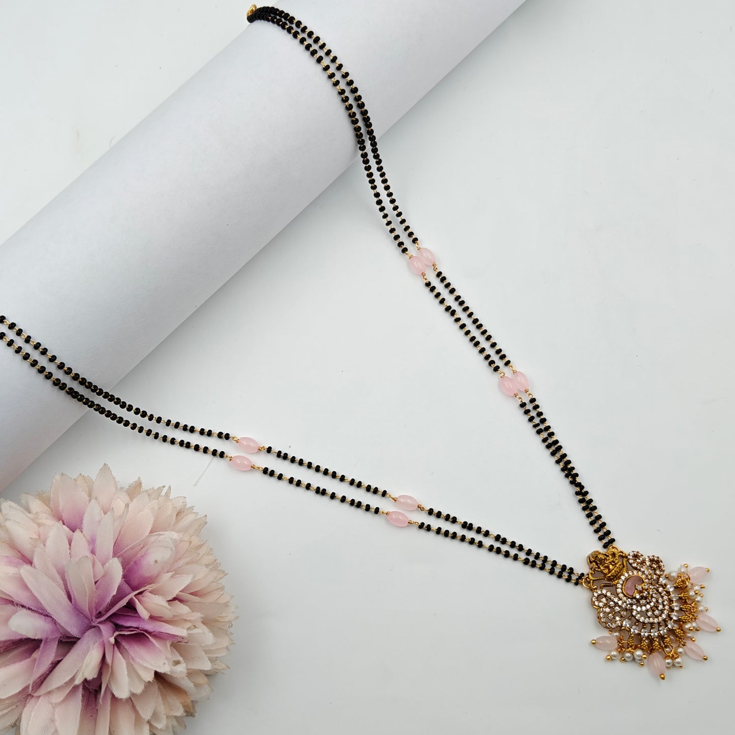 39840 2 lines black beads with Lakshmi locket and pink monalisa beads