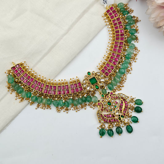 40578 Jadau Flexible Red Stone Peacock Short Necklace Set