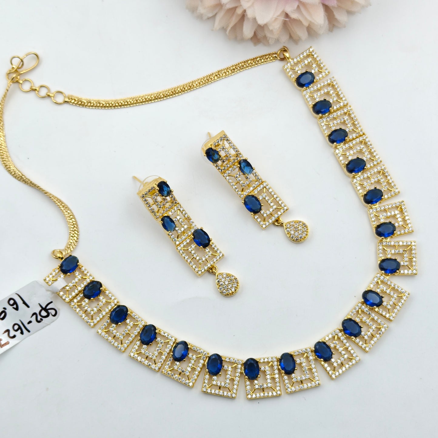Gold polish blue stone necklace