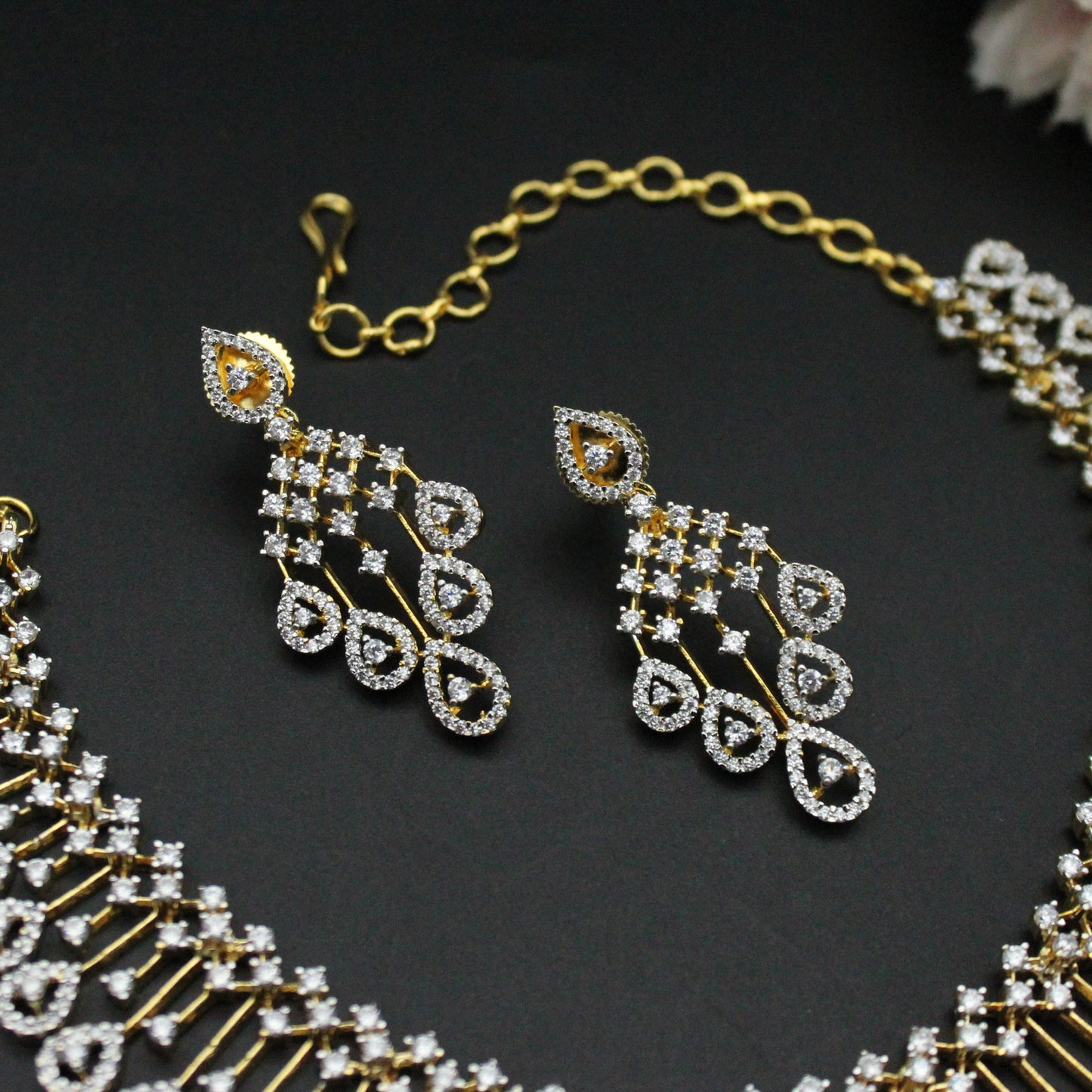 Real diamond look replica necklace with drop shape pattern