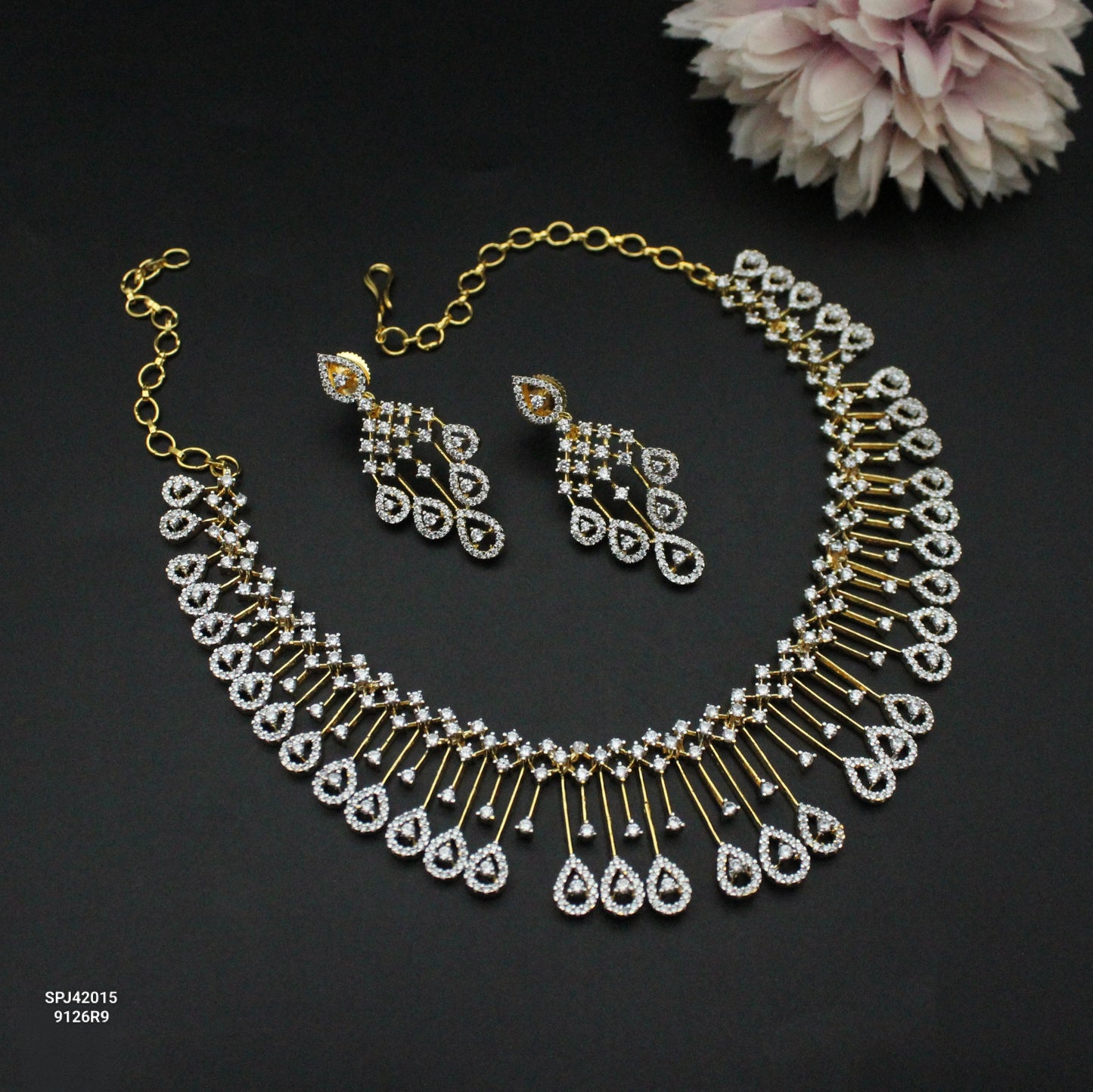 Real diamond look replica necklace with drop shape pattern