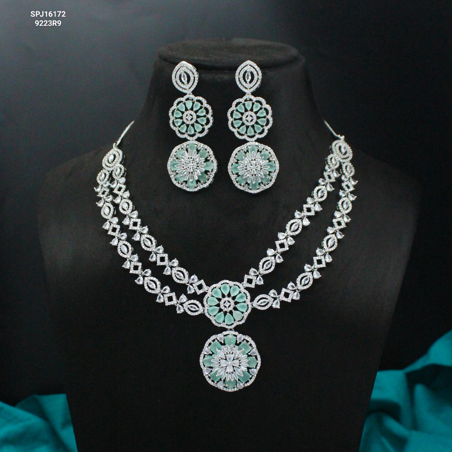 Platinum Mint Blue Floral Short Necklace Set With Push Back Earrings And Maangtikka 16172