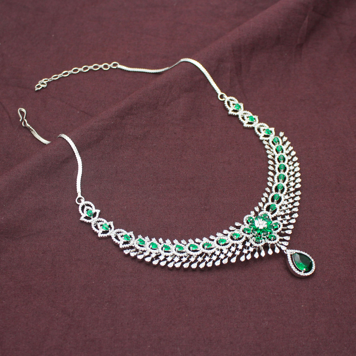 Elegant Platinum Floral Drop Stone Emerald Green Fancy Short Necklace Set With Push Back Statement Earrings Party Wear Jewellery 43000