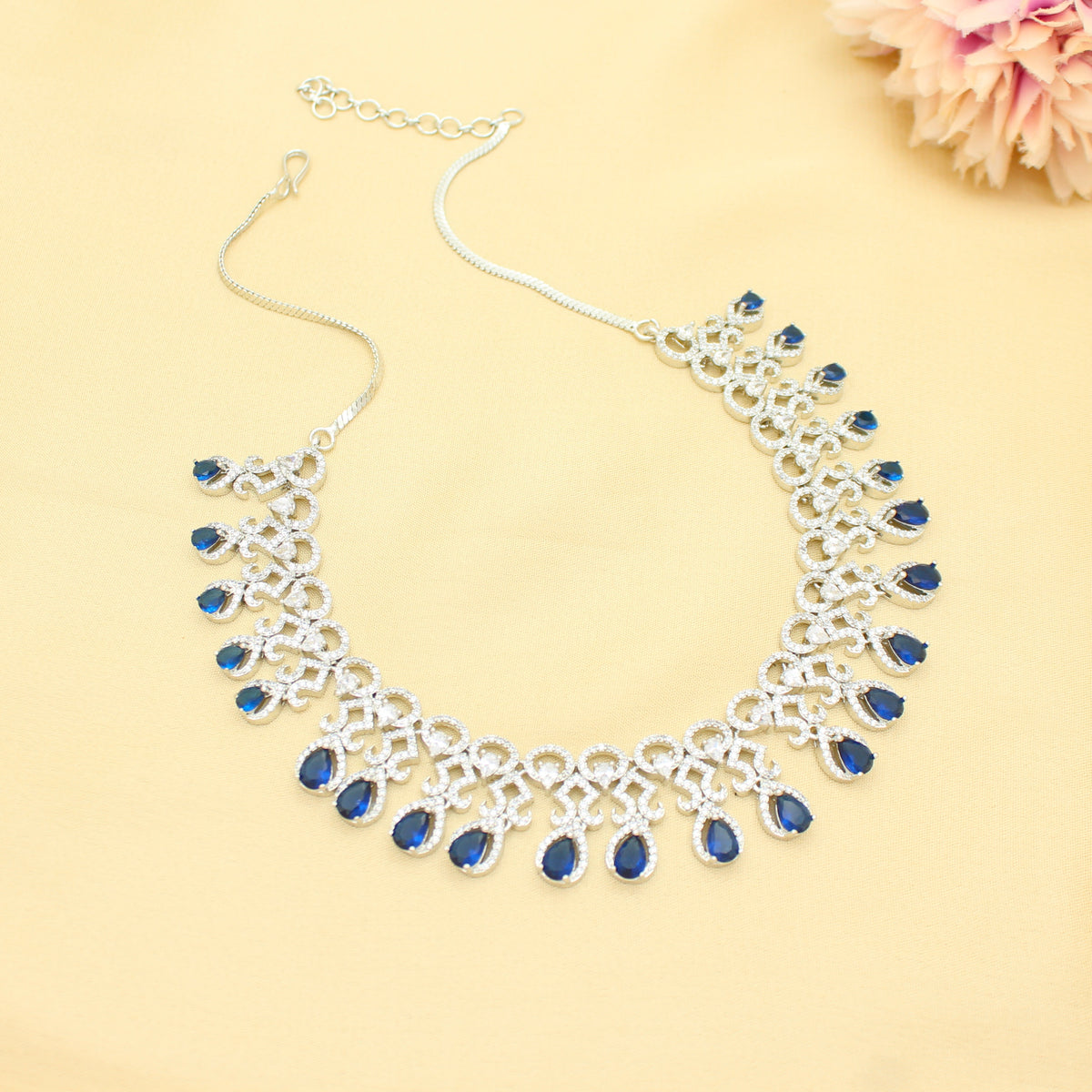 Platinum Party Wear Drop Pattern Blue Stones Short Necklace Set With Push Back Earrings 43014