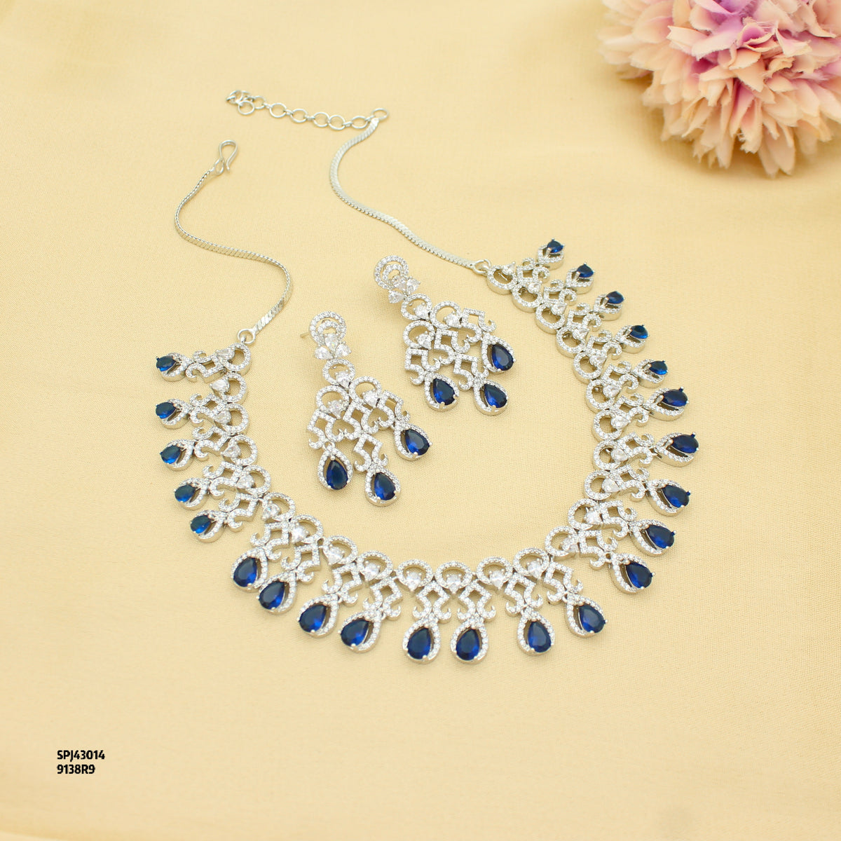 Platinum Party Wear Drop Pattern Blue Stones Short Necklace Set With Push Back Earrings 43014