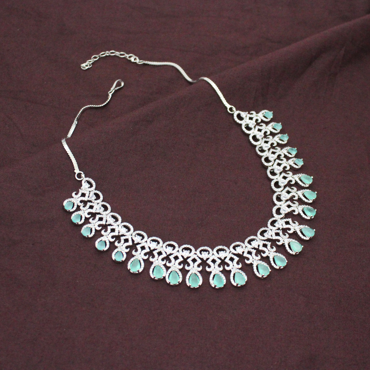 Platinum Party Wear Drop Pattern Mint Green Stones Short Necklace Set With Push Back Earrings 43011