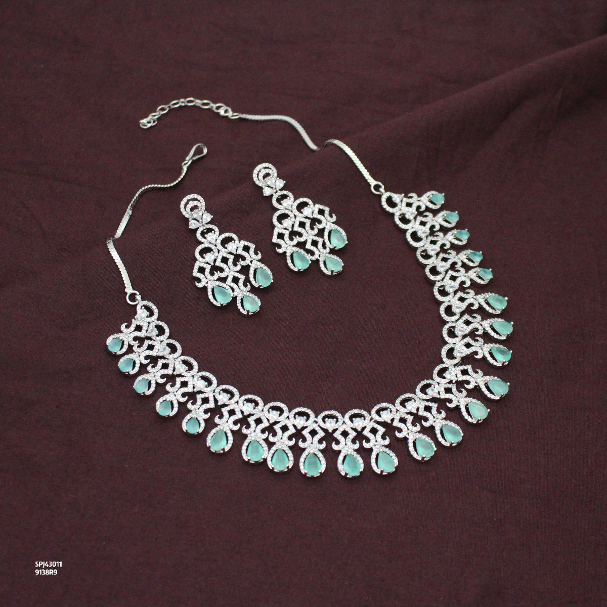 Platinum Party Wear Drop Pattern Mint Green Stones Short Necklace Set With Push Back Earrings 43011
