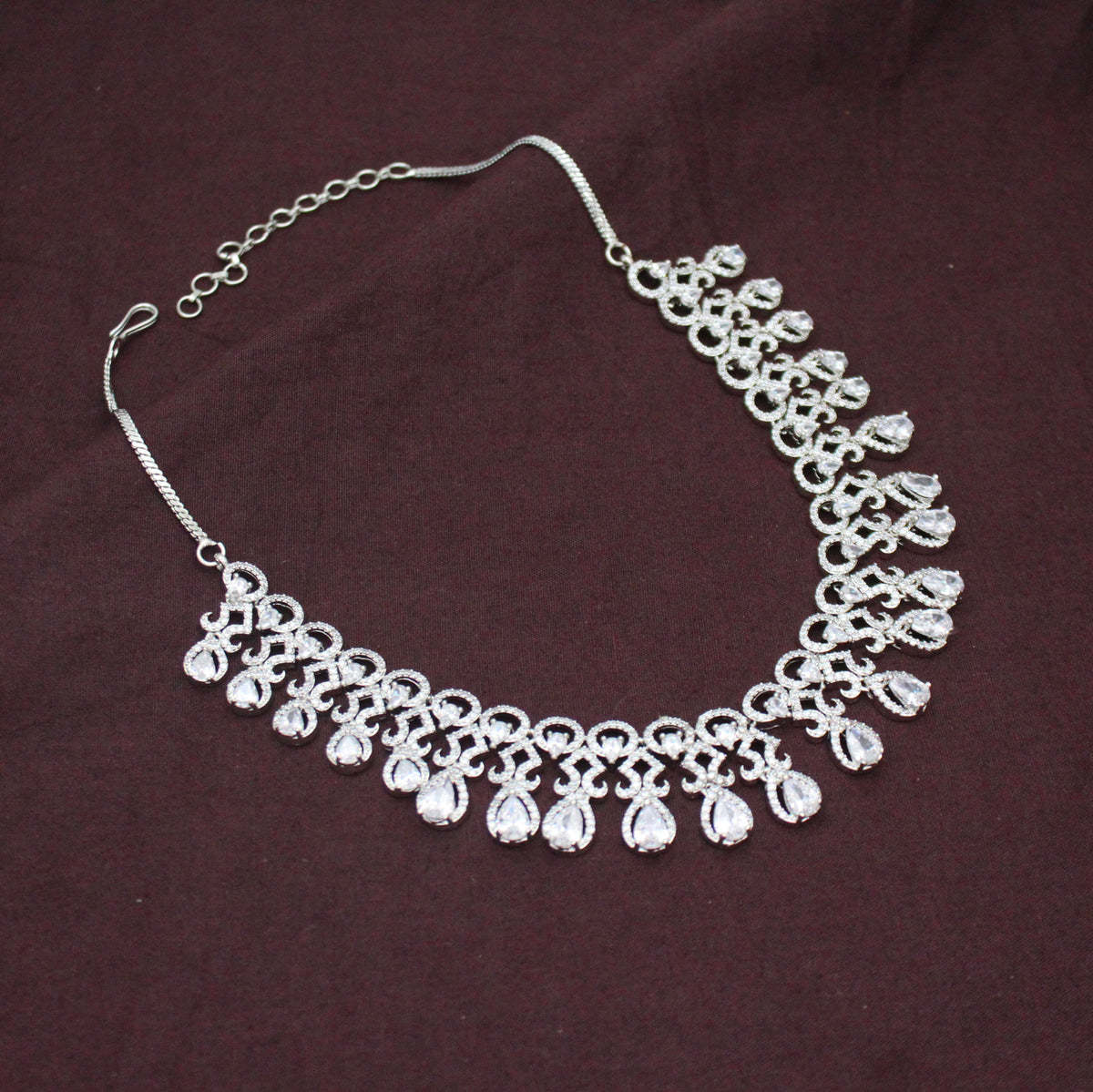 Platinum Party Wear Drop Pattern Full White Stones Short Necklace Set With Push Back Earrings 43009