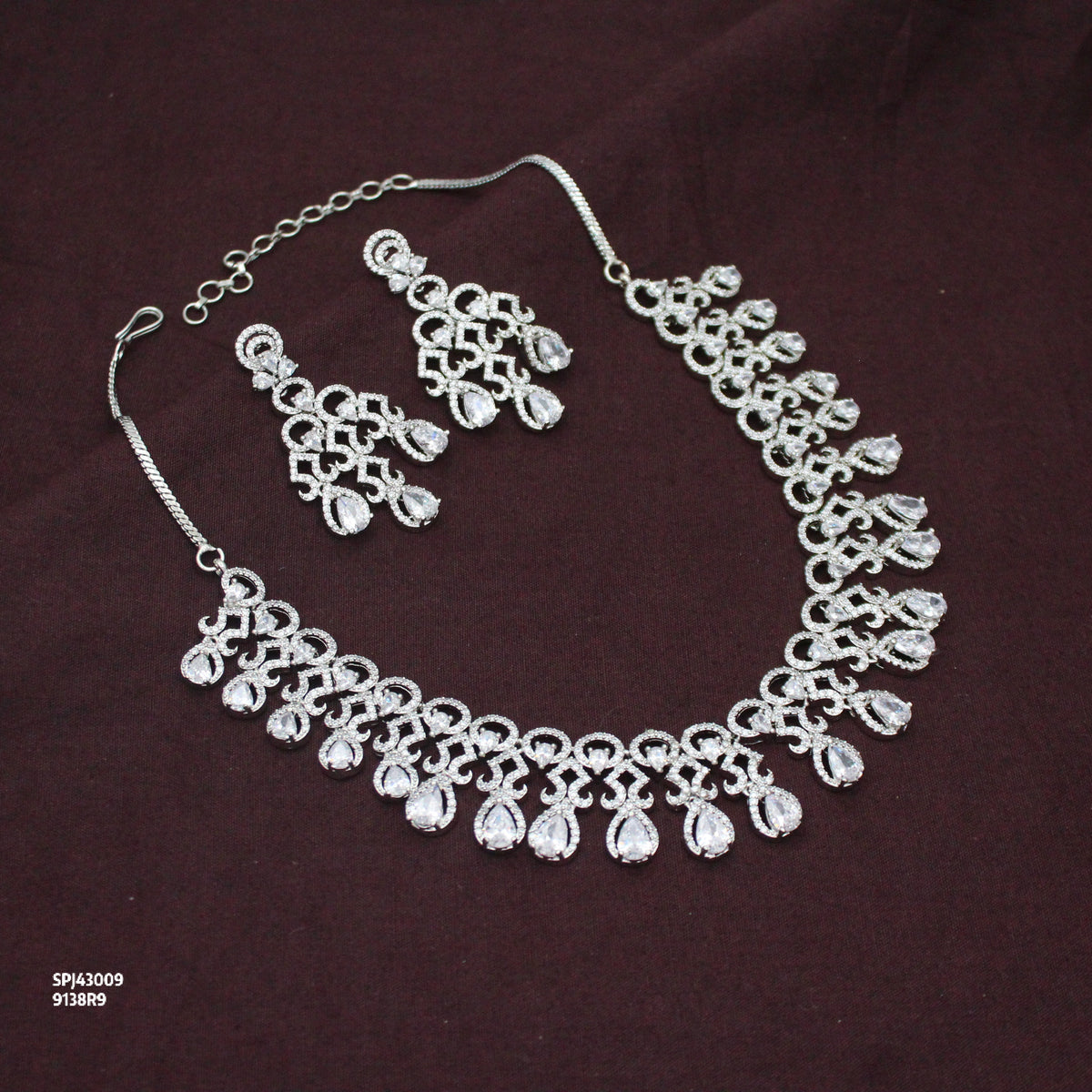 Platinum Party Wear Drop Pattern Full White Stones Short Necklace Set With Push Back Earrings 43009