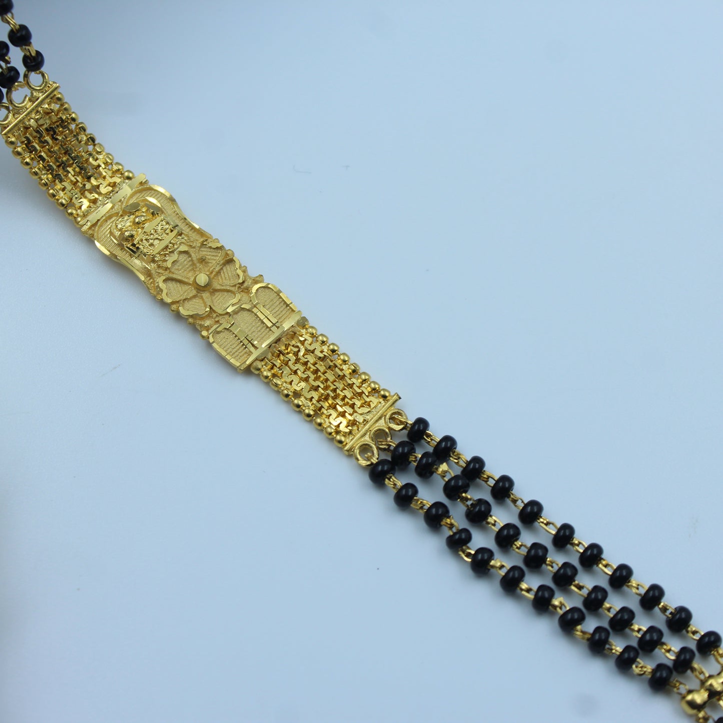 22261 Triple-layer gold mangalsutra with black beads