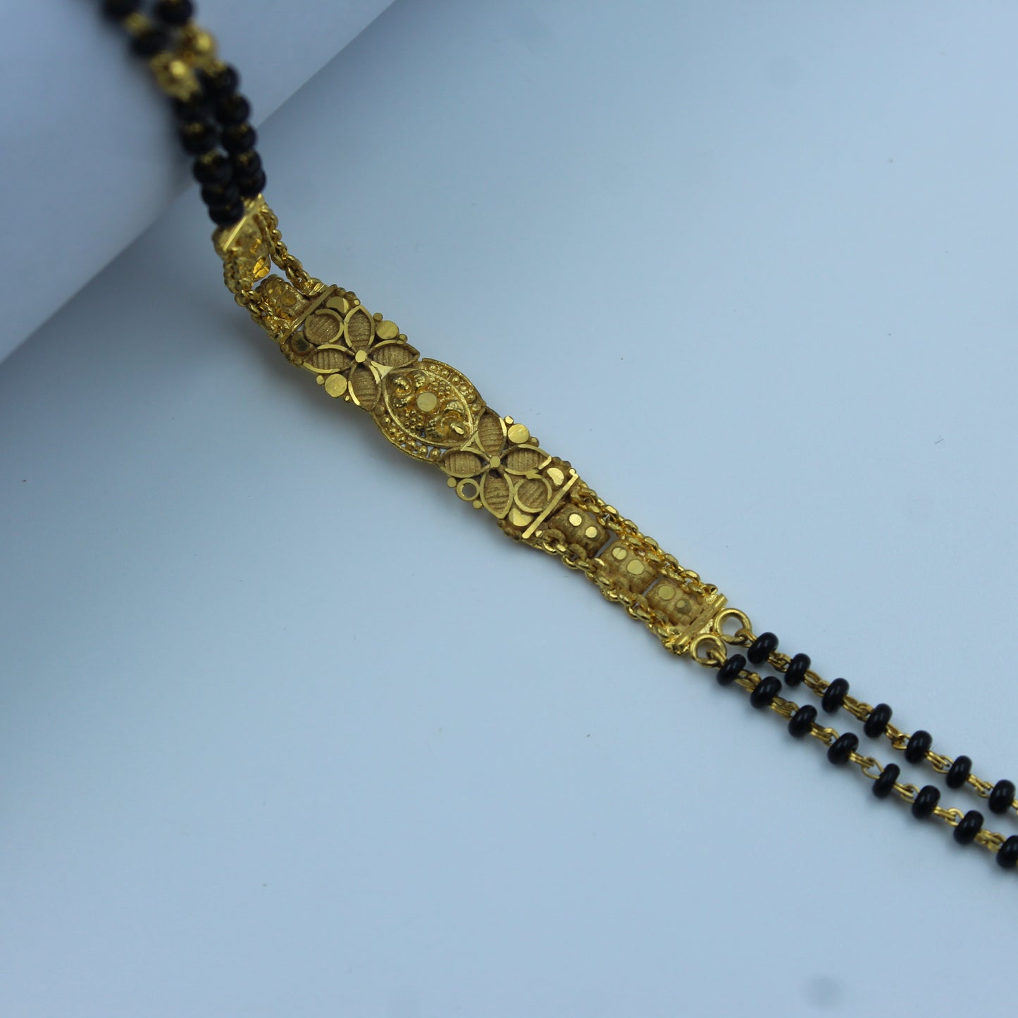 22246 Traditional Gold-Plated Black Bead Mangalsutra with Decorative Bar Design