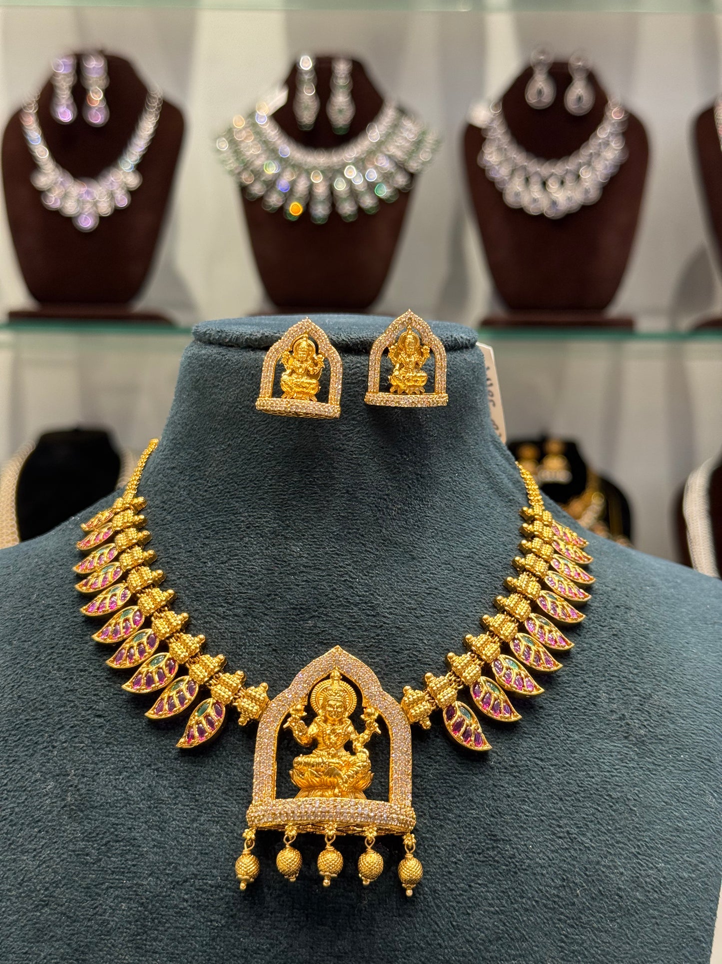 38646 Lakshmi Devi short necklace with pota stones and golden balls