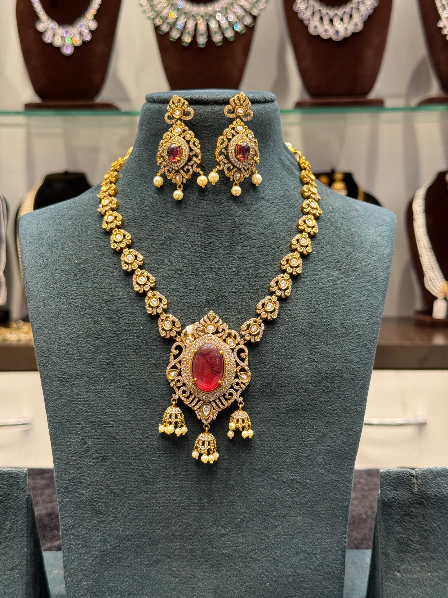 Victorian mehendi single line necklace with Chandbali and red duplet stones
