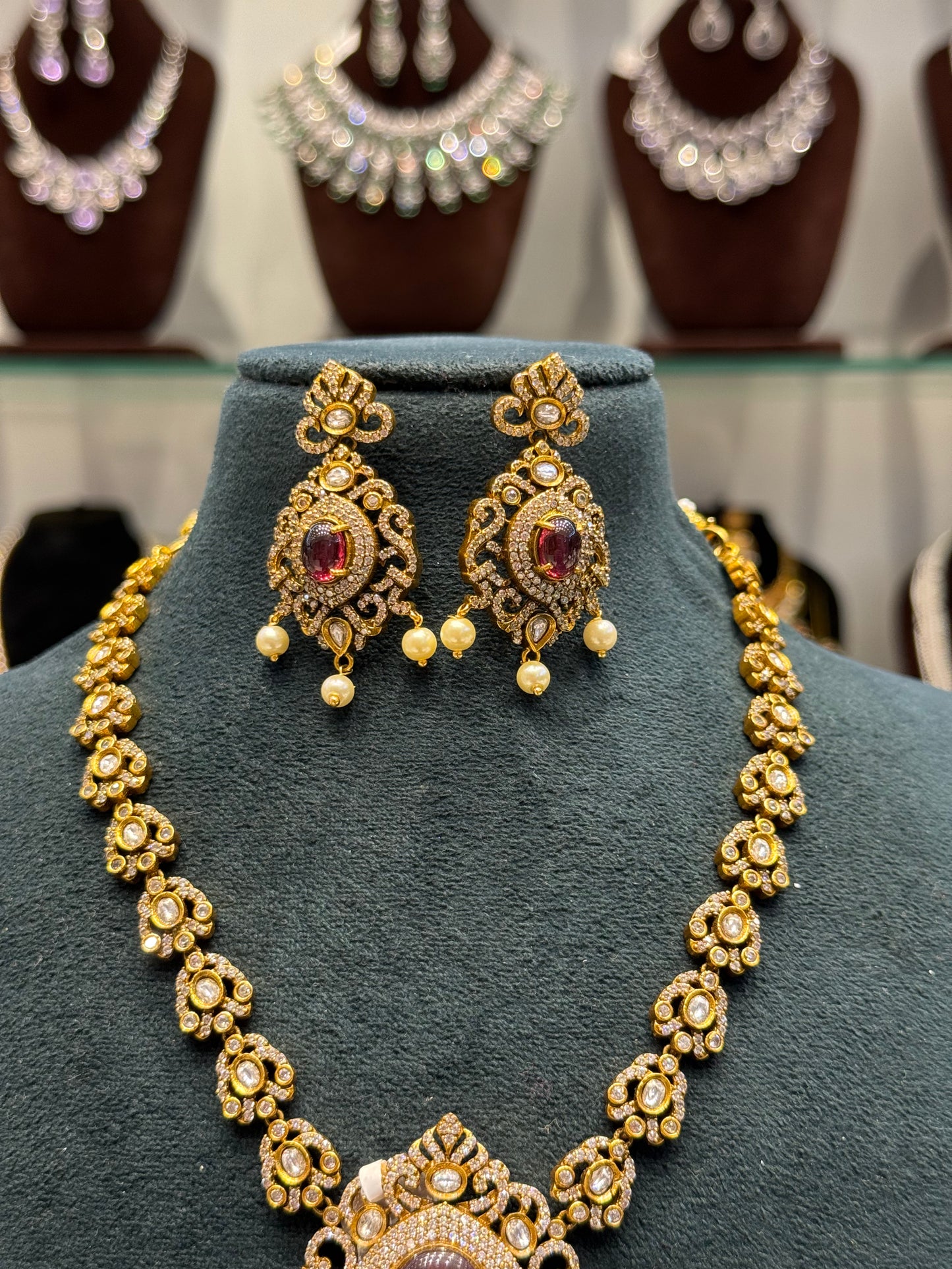 Victorian mehendi single line necklace with Chandbali and red duplet stones