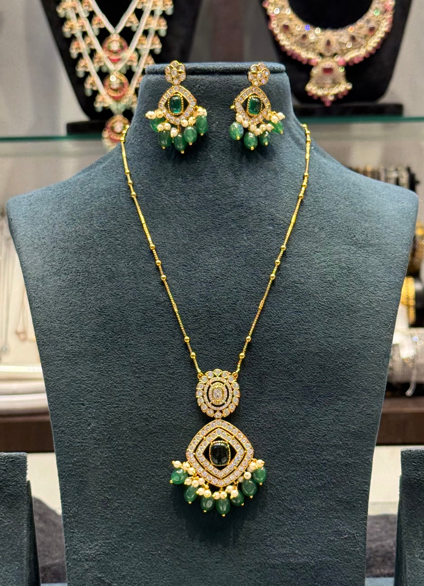 40051 Single Line Golden ball chain with green pendant set