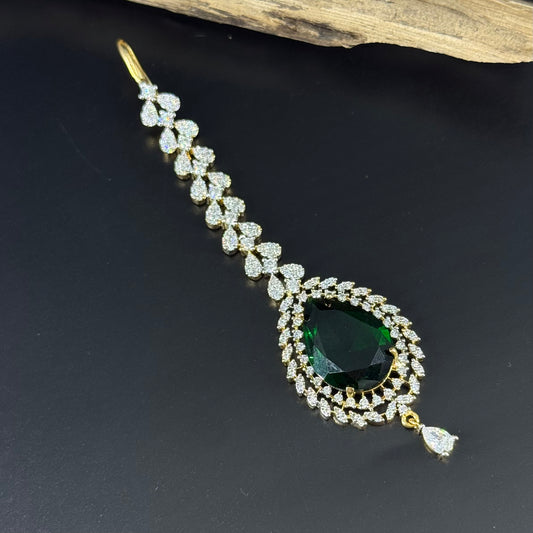 39120 diamond look Mangtikka with emerald stones